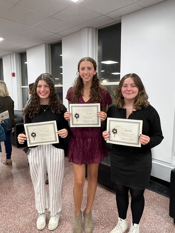 The newly inducted English Honor Society members are a happy bunch.