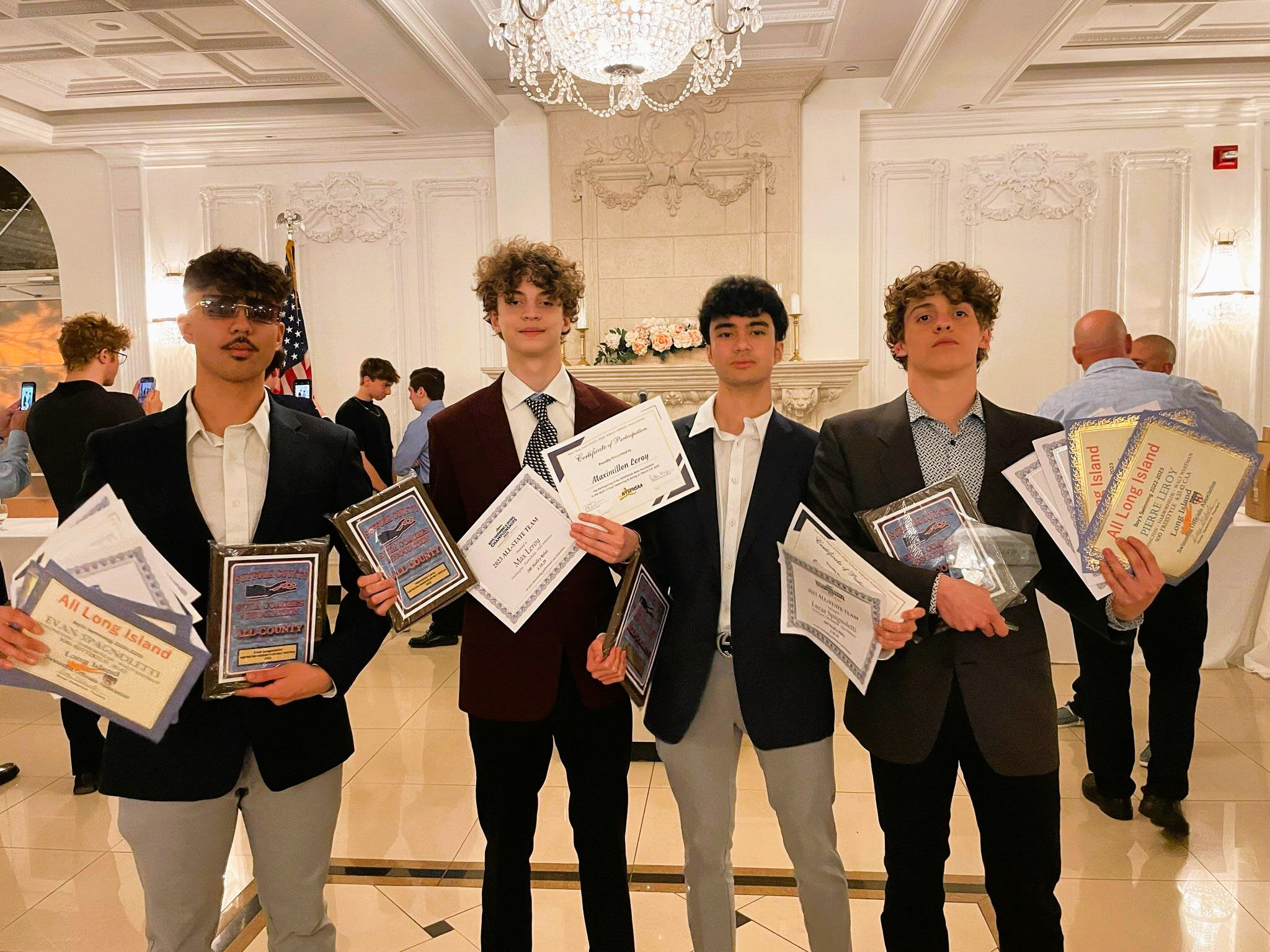  The Huntington boys' swimming team's Big Four at the county dinner at Villa Lombardi's.  