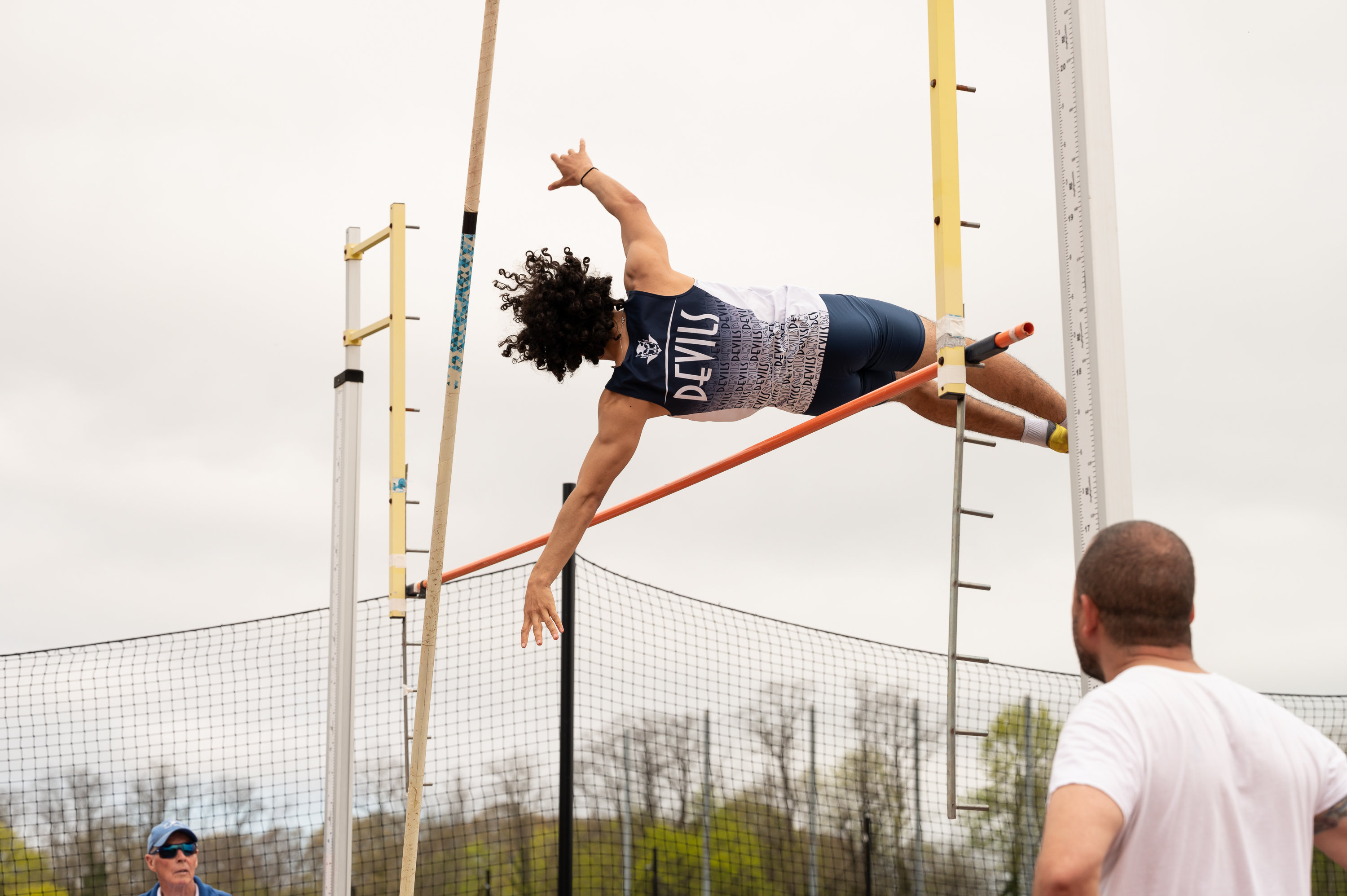  Gabe Abreu scales the pole vault bar. (Darin Reed photo.)  