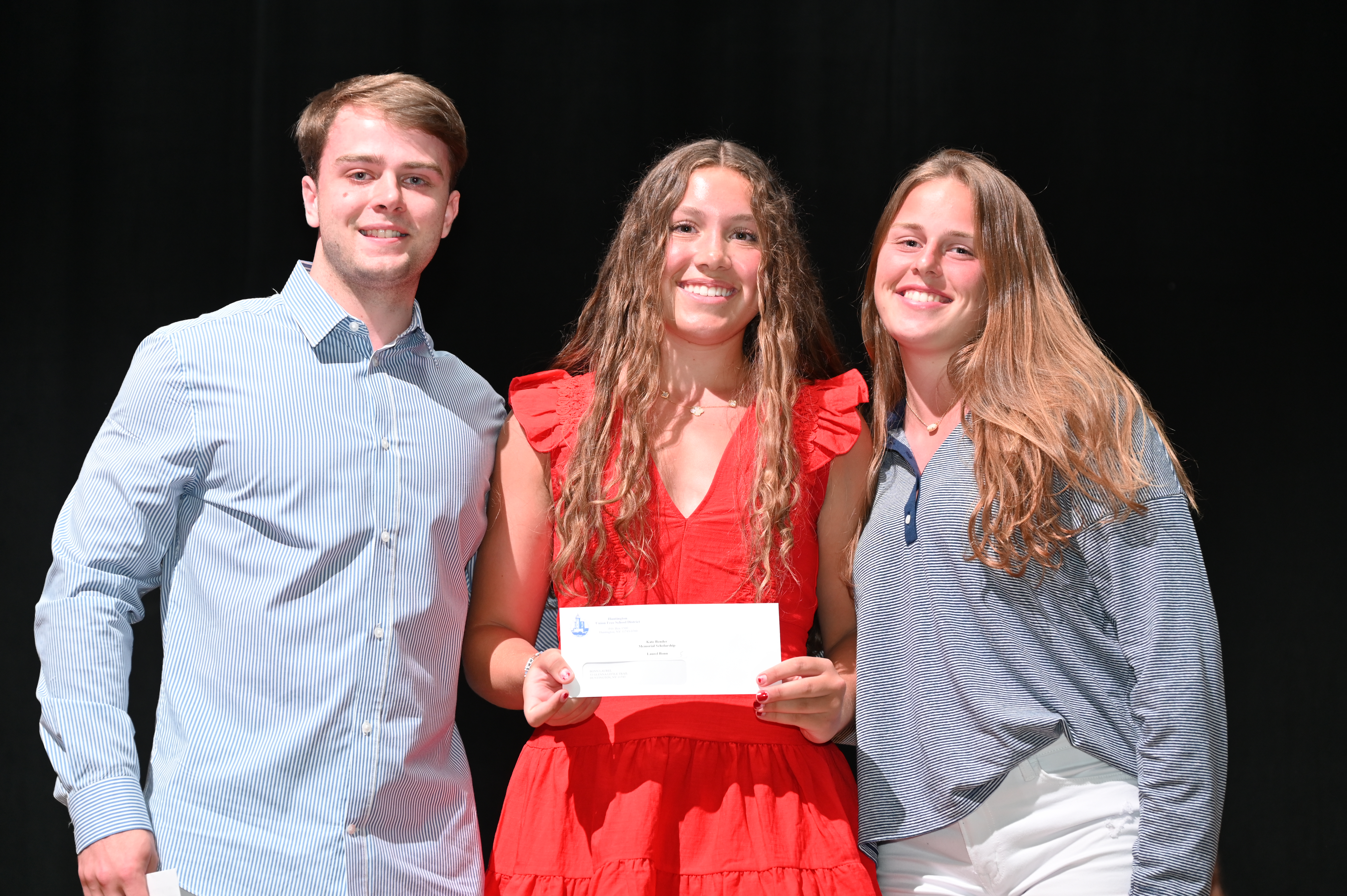  Aidan and Kayleigh Bender flank Kate Bender Memorial Scholarship recipient Laurel Bonn   