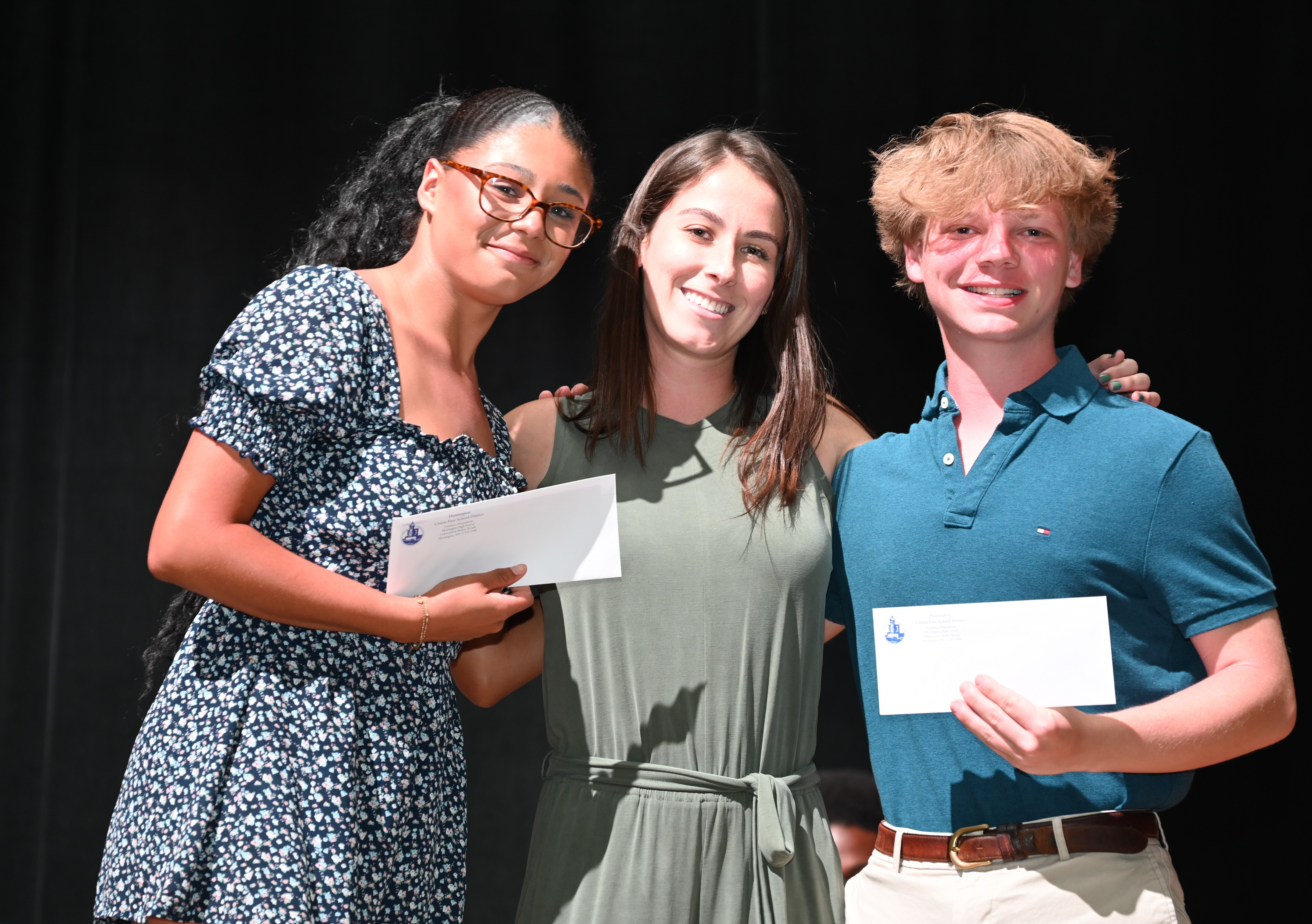  Alexa Edwards is flanked by Dennis Edwards Scholarship recipients Hope Bilkey and Dylan Hanna   