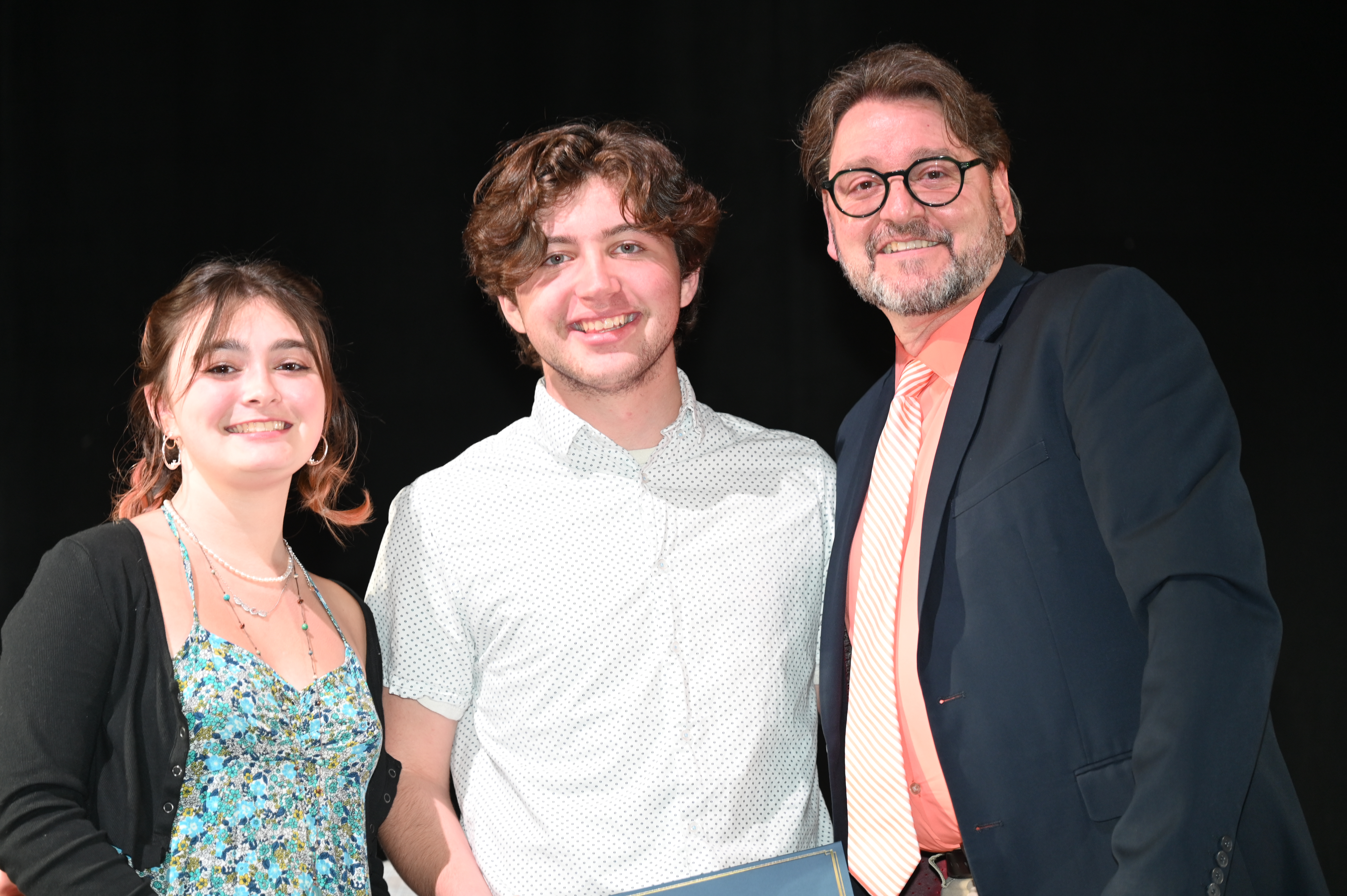  Linnea Wong and Dylan Brinn with Huntington drama club advisor Michael Schwendemann.   