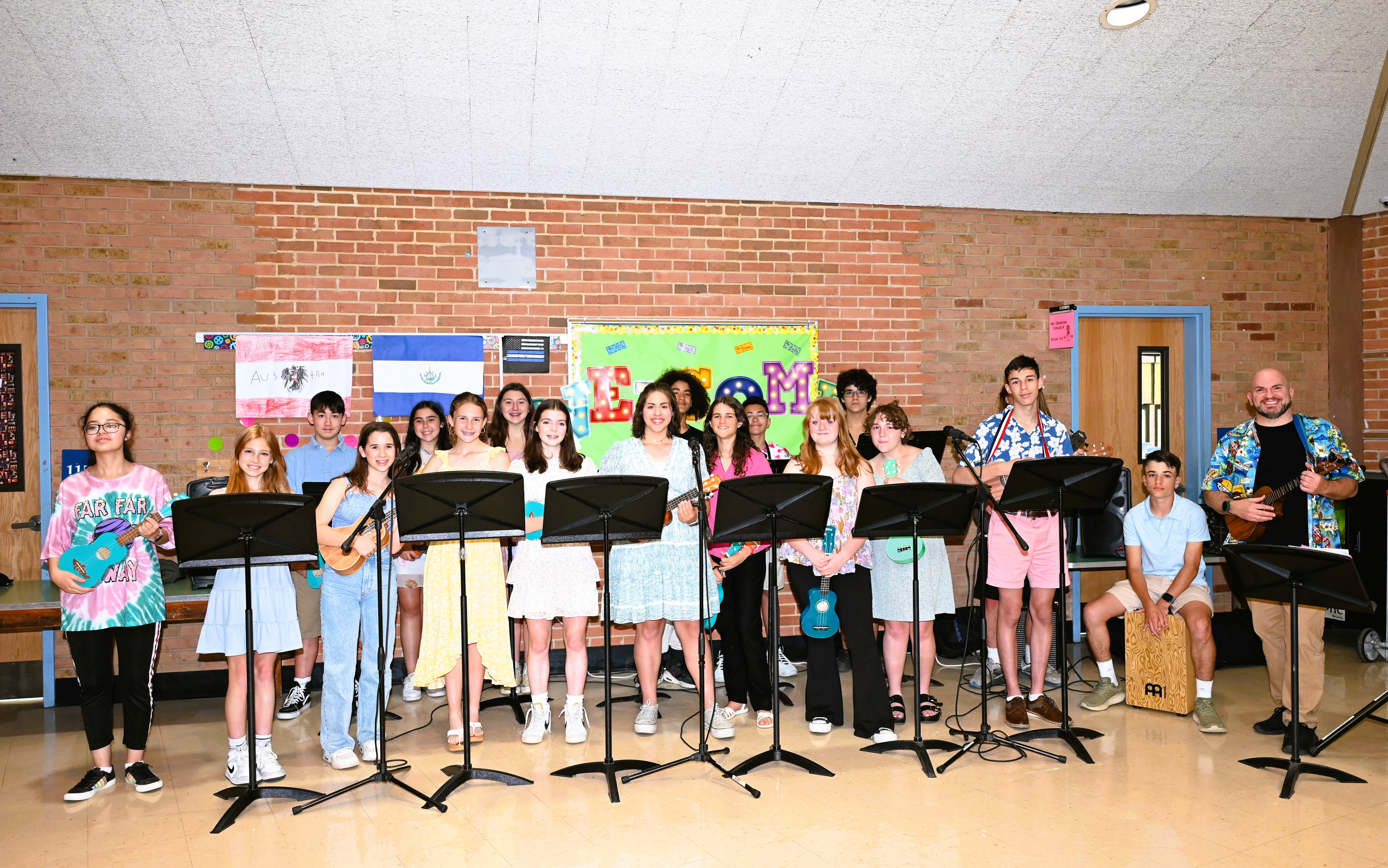  Faculty advisor Frank Battista with members of the Finley Ukulele Club.  