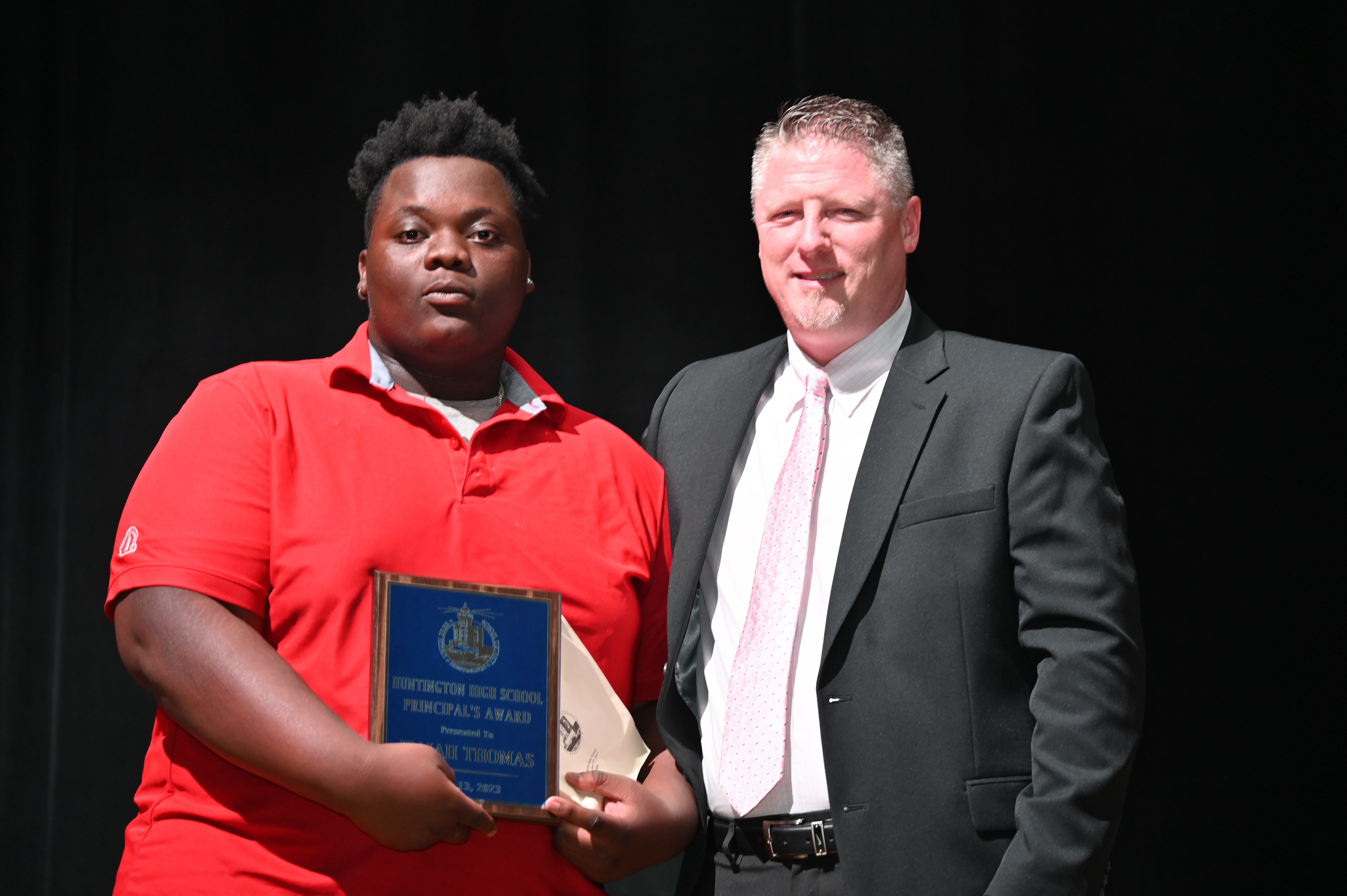  Principal's Award recipient Isaiah Thomas with Huntington Principal Brenden Cusack.  