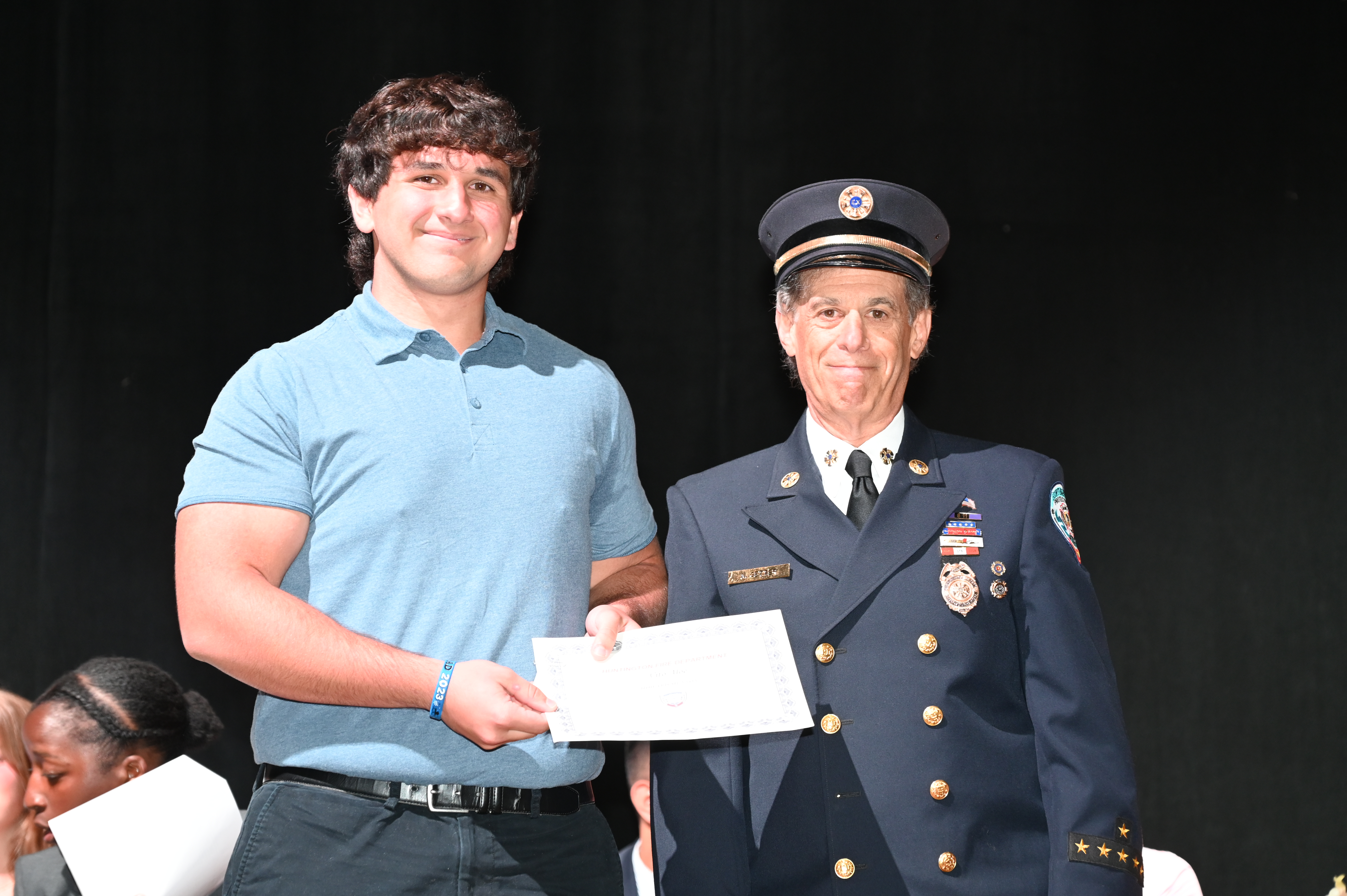  Howard Munson Scholarship Award recipient Vito Aloe with Ex-Chief Neil Getter of the Huntington Fire Department.   