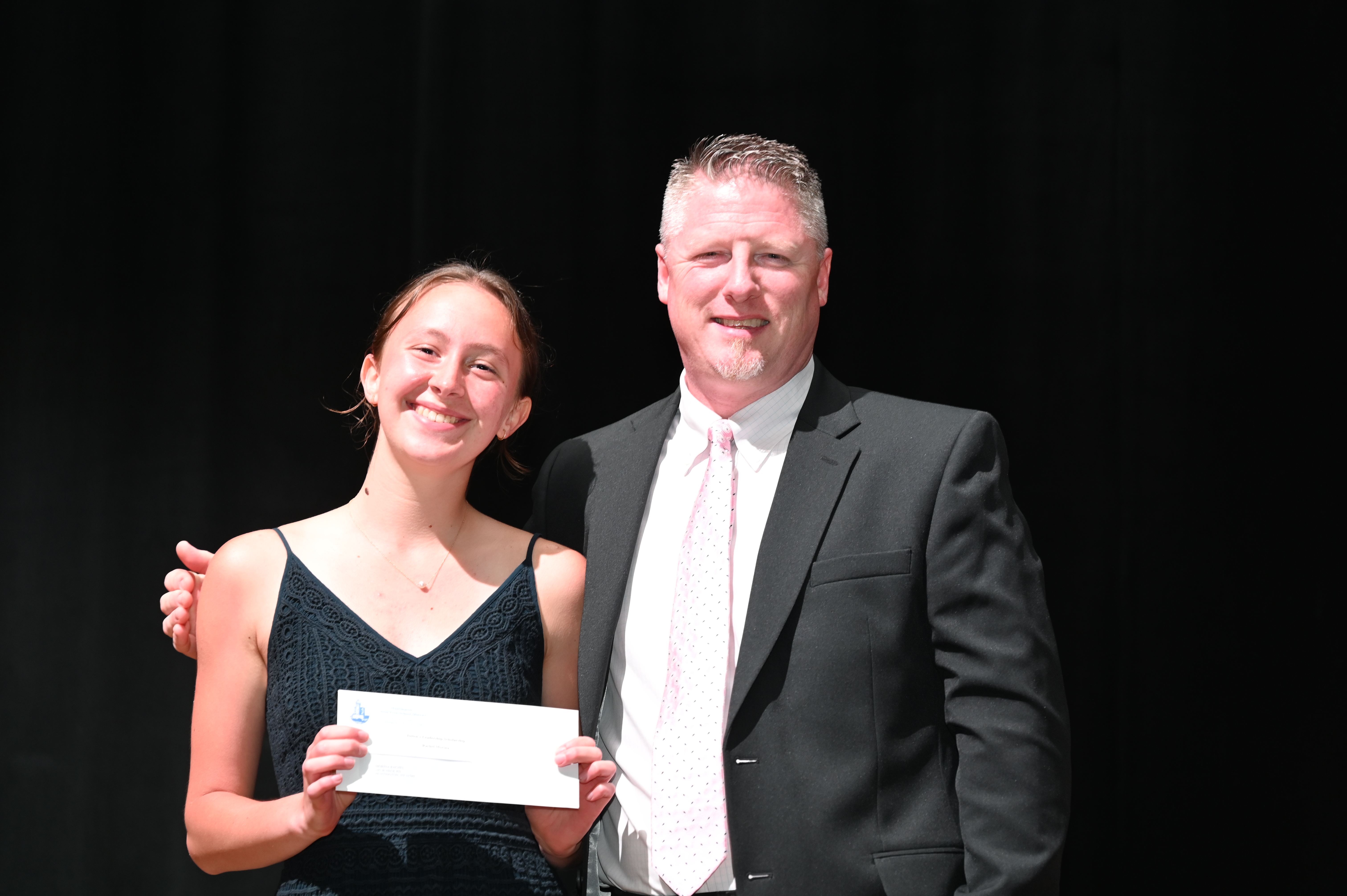  Josten's Leadership Scholarship award recipient Rachel Morina with Principal Brenden Cusack   