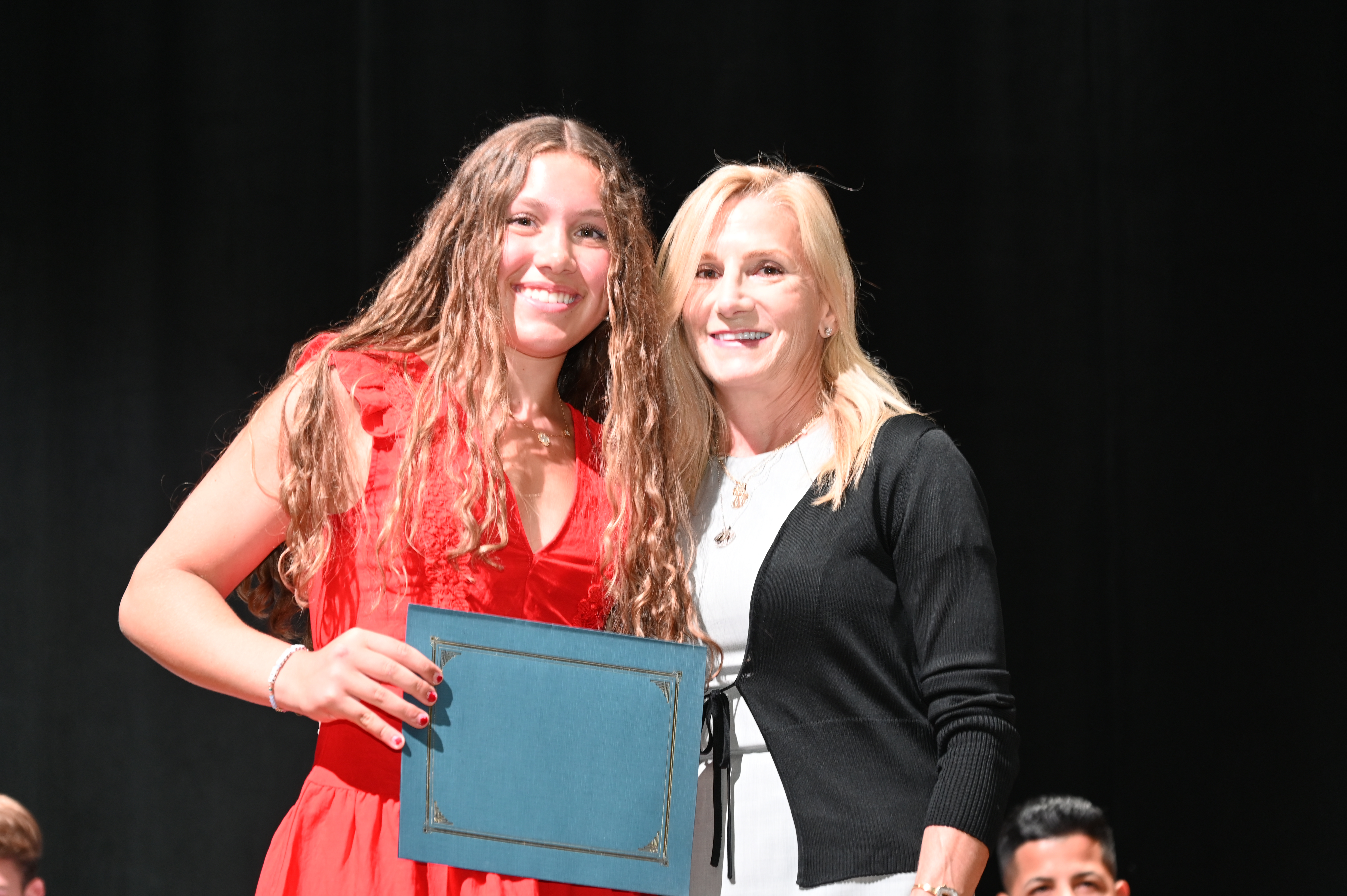  T. Christopher Pettit Memorial Scholarship recipient Laurel Bonn with Laura Pettit-Breingan.  (2)  