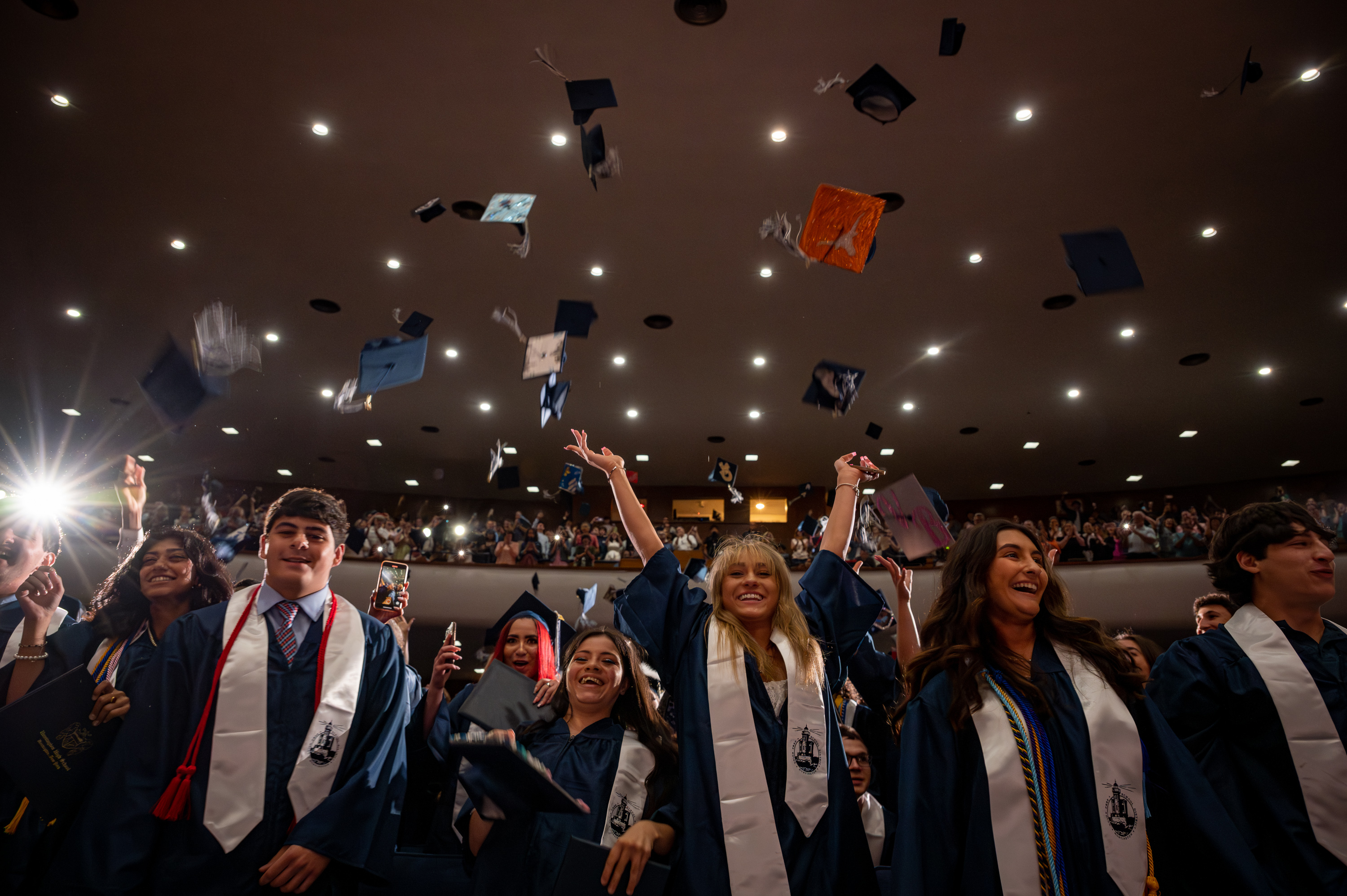  The Class of 2023 tossed their commencement caps into the air when the ceremony concluded. (Darin Reed photo.)  