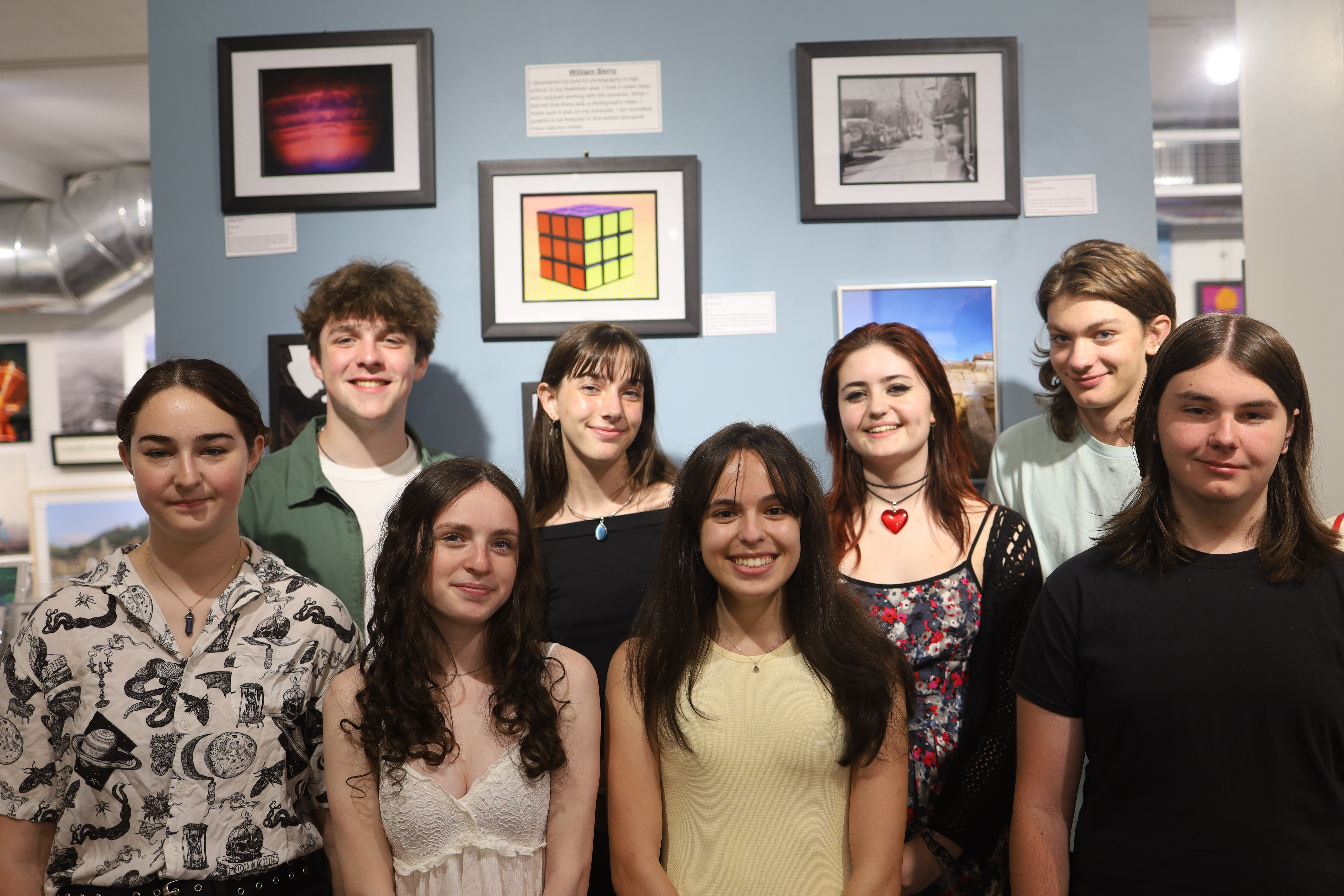  The eight Huntington High School artists gathered at the Firefly gallery in Northport with their work   