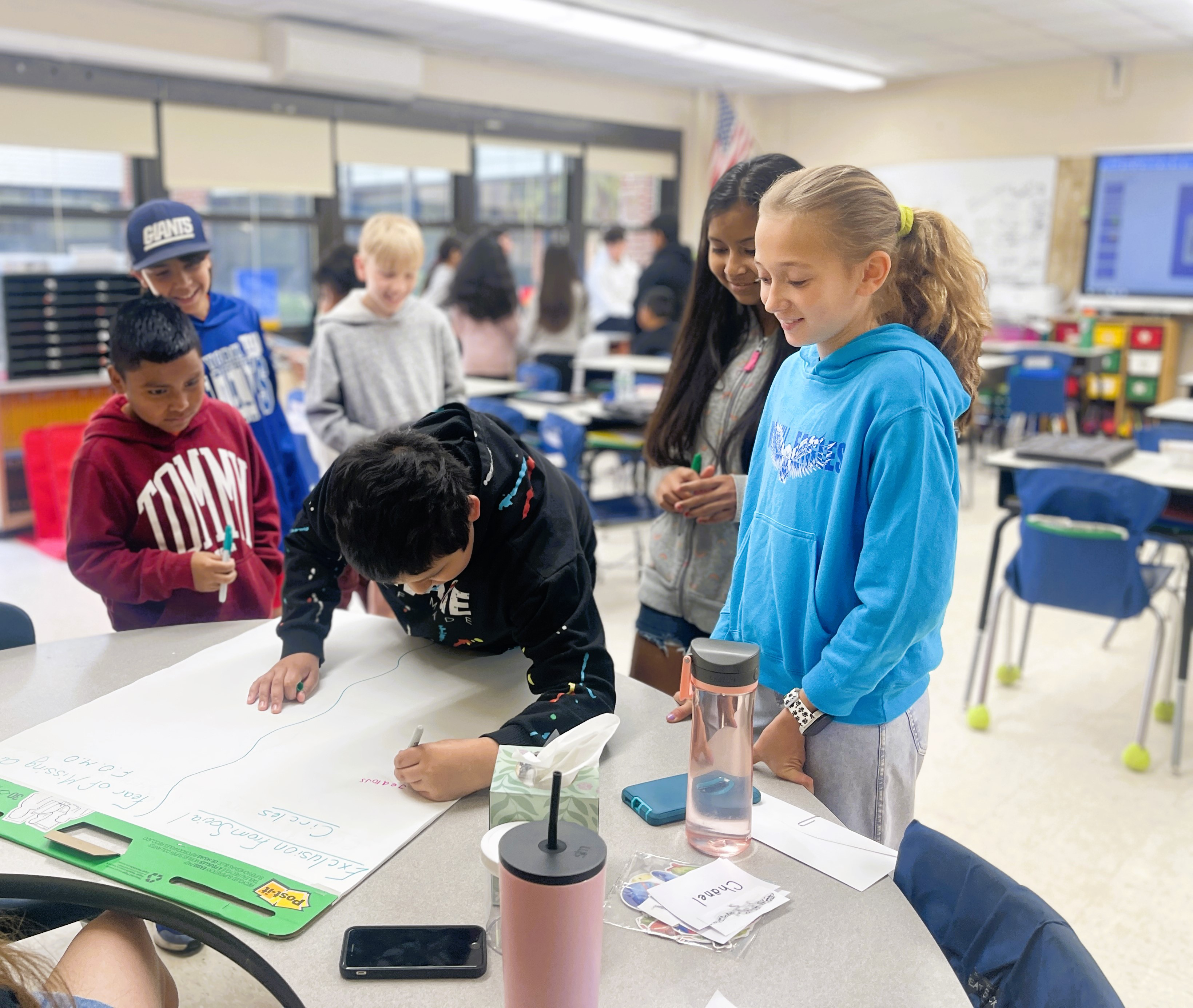 Woodhull School fifth graders engaged in a training program presented by A World of Difference club members