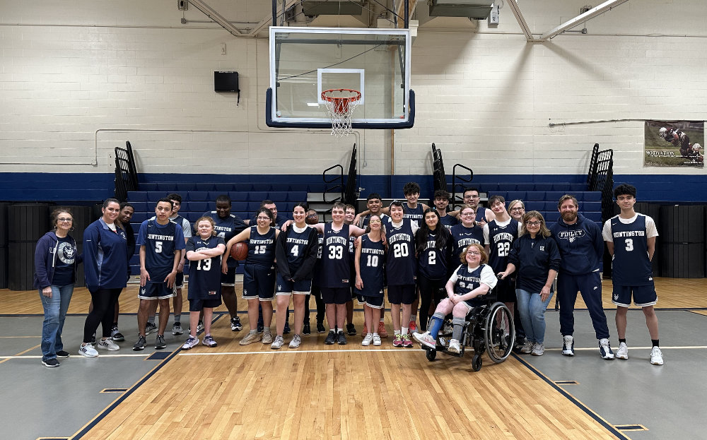  Huntington Unified basketball players and coaches before this week's game against John H. Glenn.   