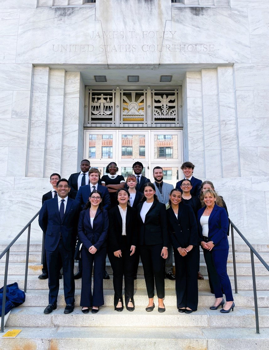  Huntington mock trial team members head into US District Court in Albany for the state finals.  