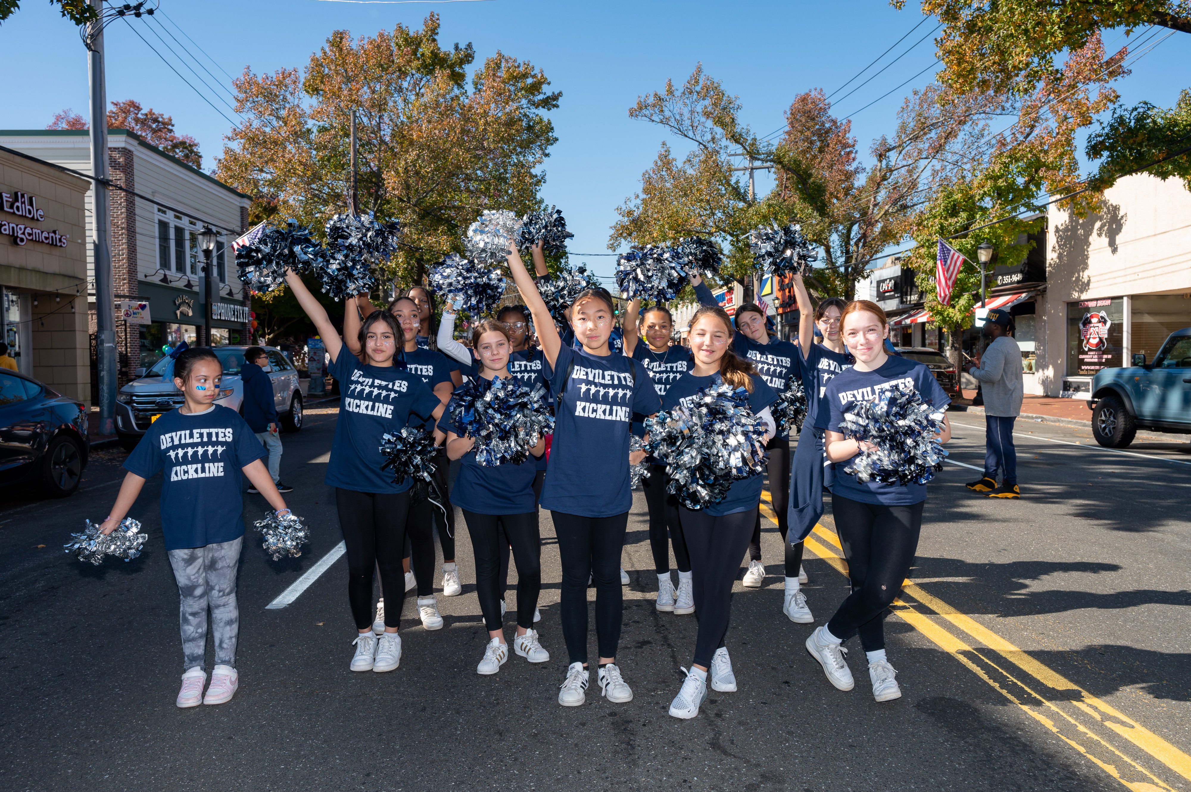 Finley Middle School Devilettes kickline team members in the Homecoming Day parade. (Darin Reed photo.)