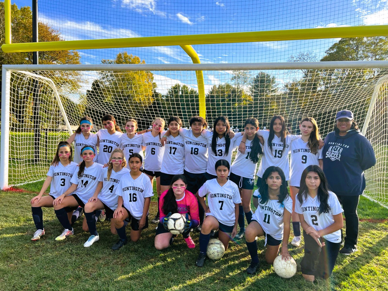  The Finley Middle School-White girls' soccer team with head coach Alicia Furman.  