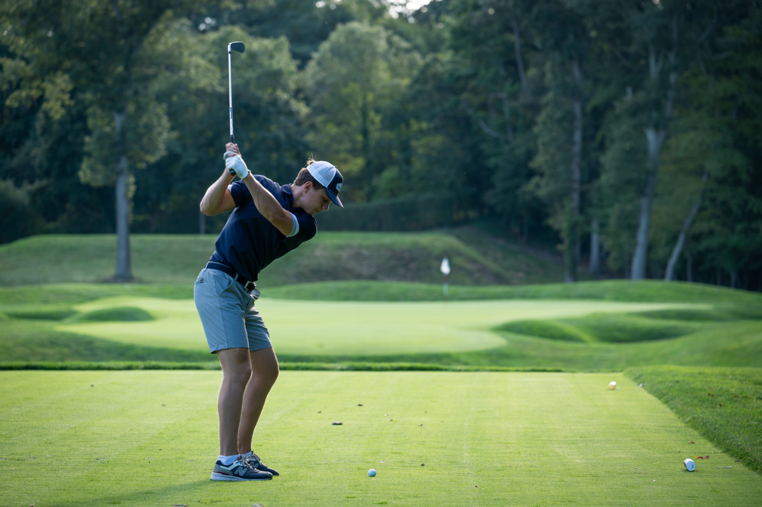  Senior Tom Girimonti tees off at the Huntington Crescent Club. (Darin Reed photo.)  