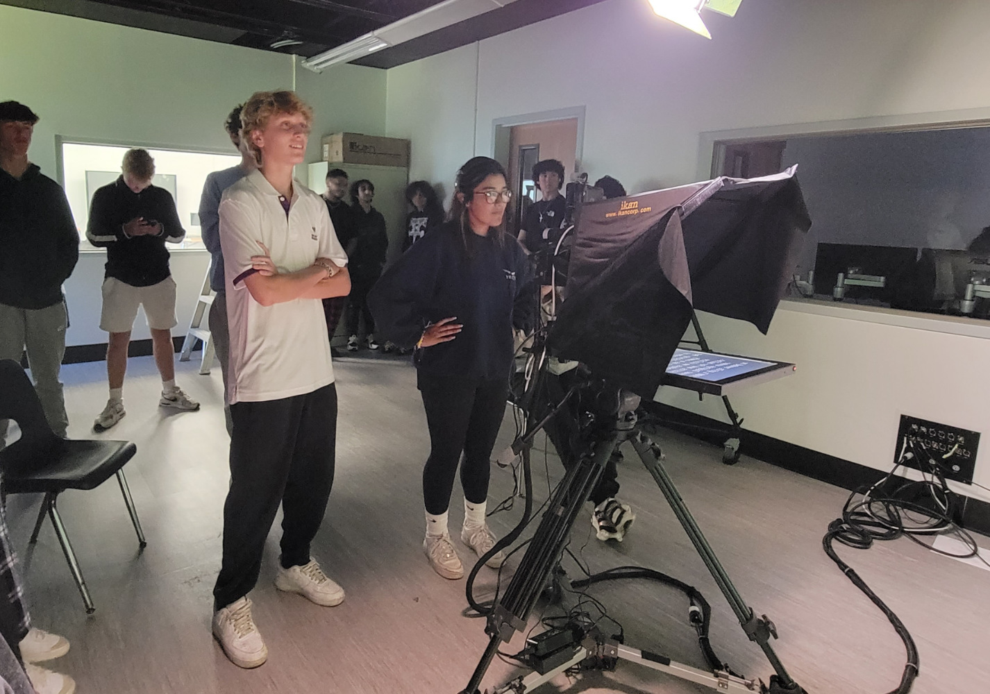  Alum James Rosselli in the high school's vide obroadcasting center.  