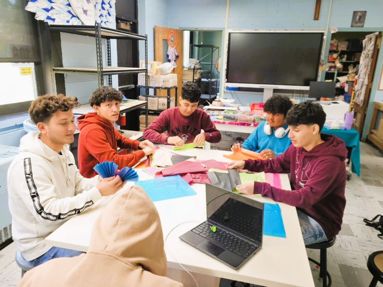 Students working on the forms for the artwork.