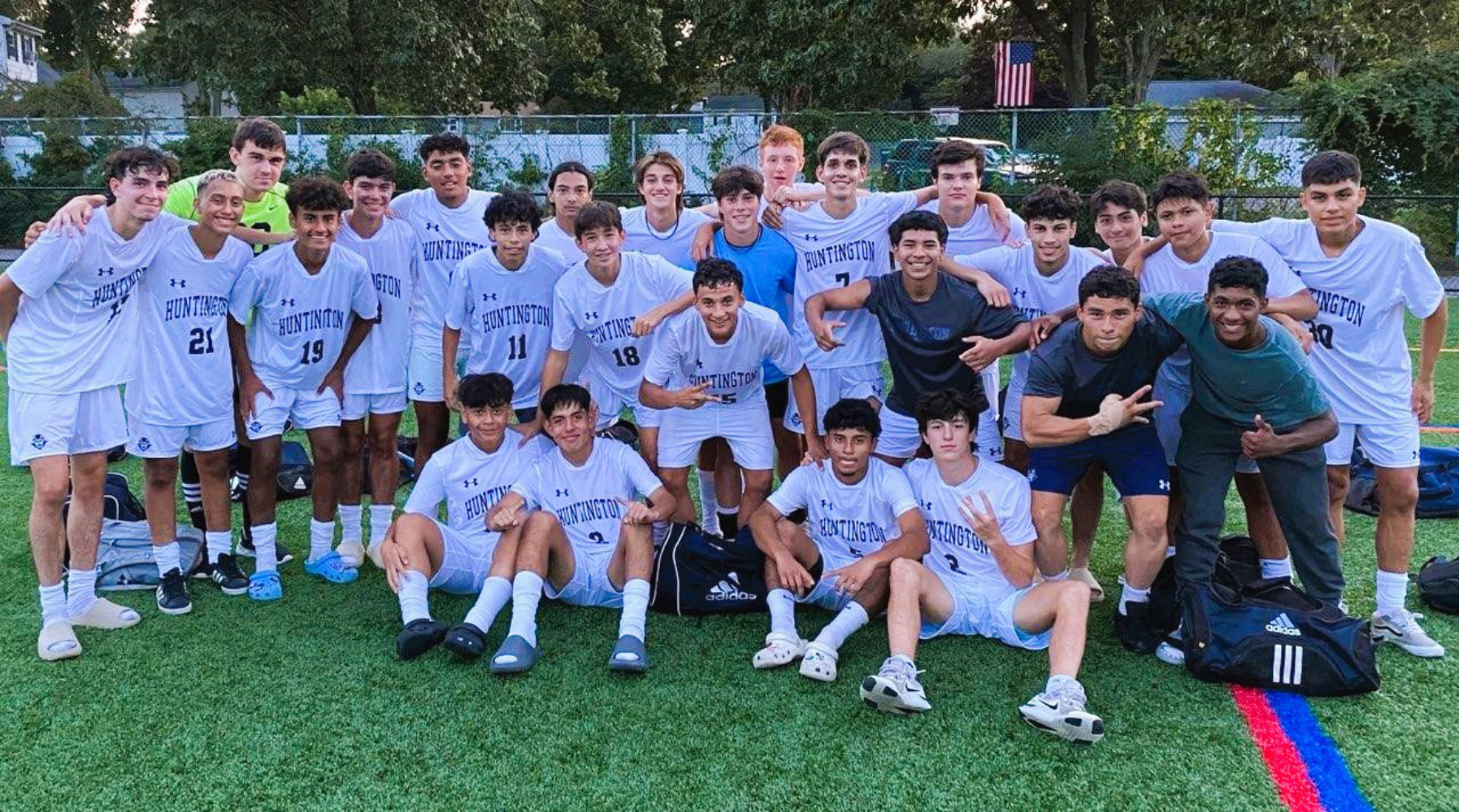  The Huntington boys' soccer team celebrated after the historic victory.  