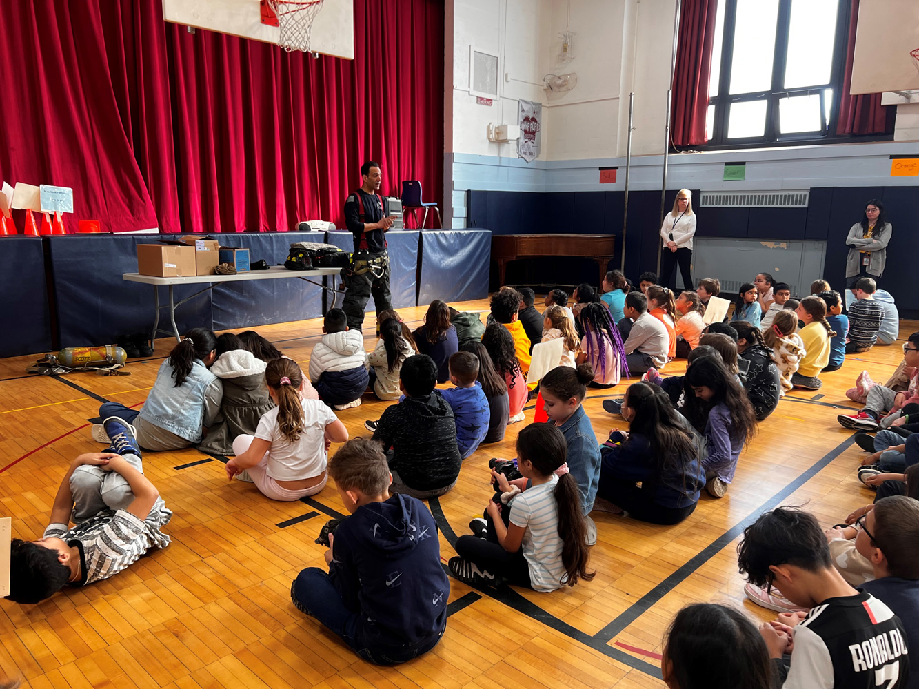  FDNY firefighter Chris Harkinish kept the attention of the third graders.  