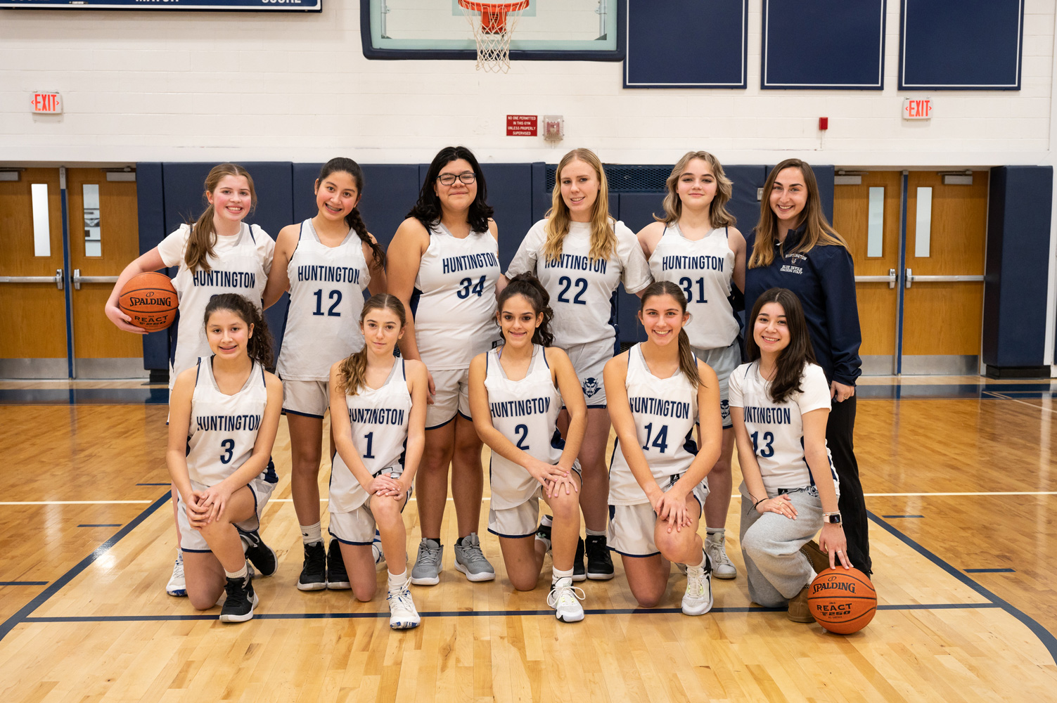  The Huntington JV girls' basketball team with head coach Katie Reilly. (Darin Reed photo.)  