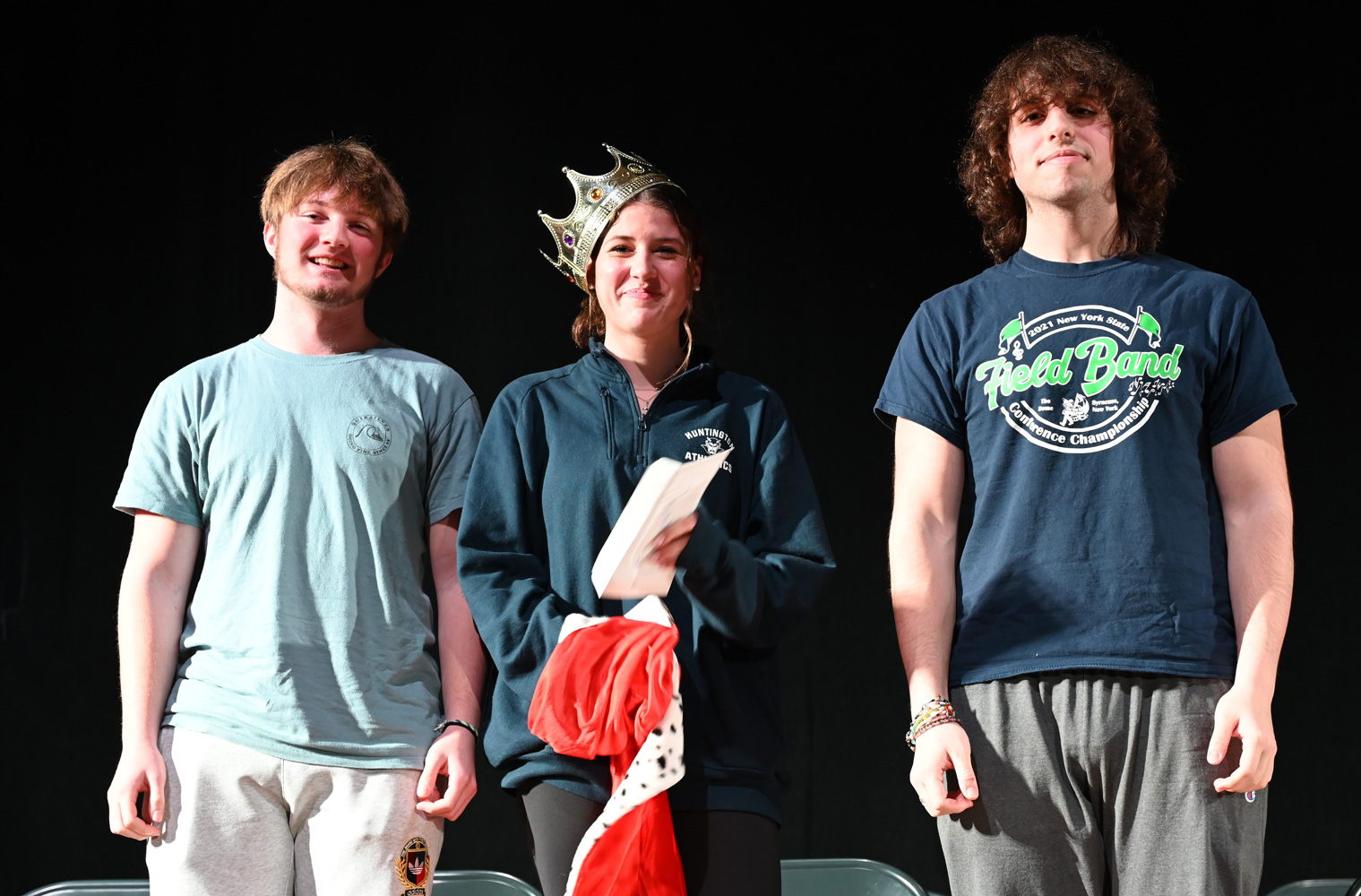  Spelling bee champion Devon St. John is flanked by finalists Ryan Curran and Peter Gaal.    