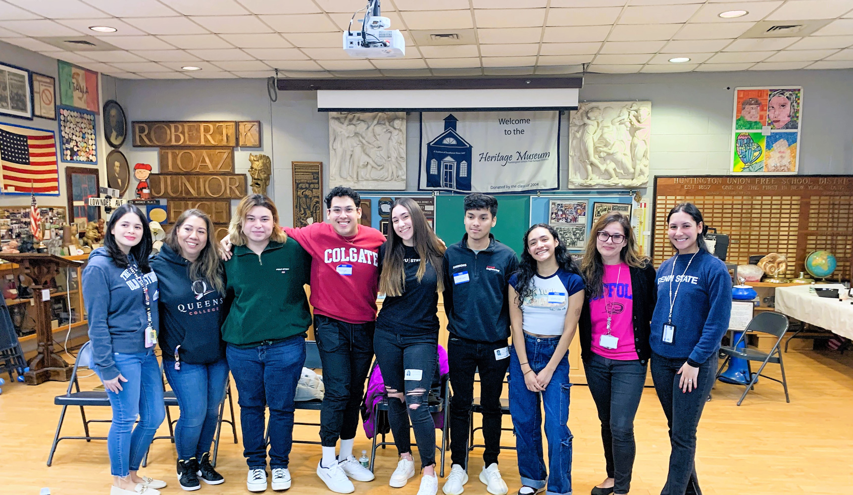  Huntington alums and counselors in the School Heritage Museum.  