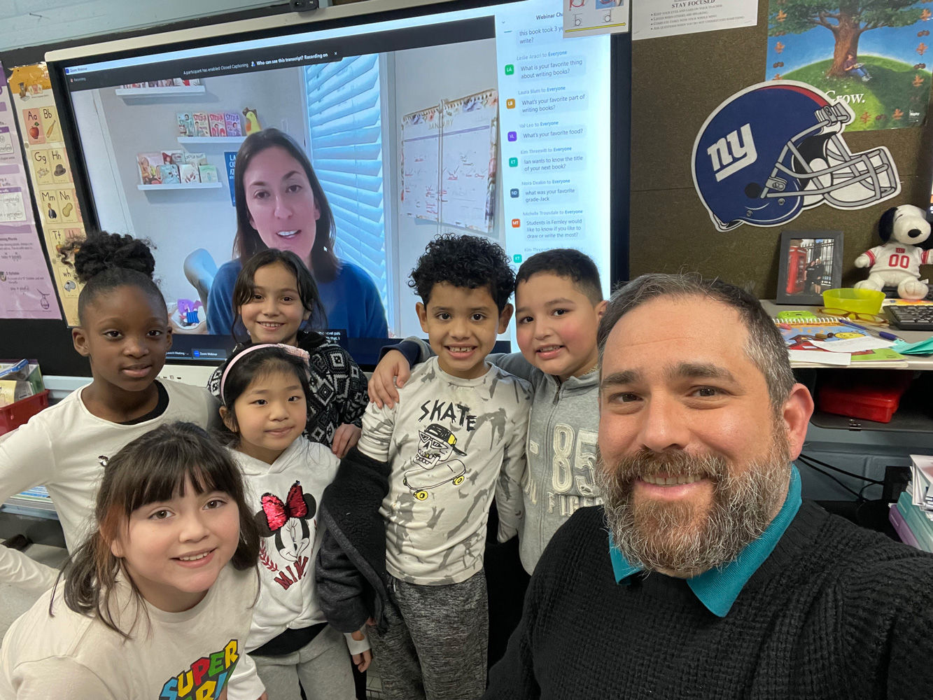  Reading teacher Jeff Dicker with his students at the virtual author visit.  