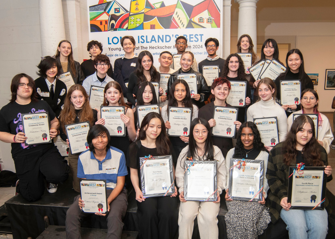  Huntington's Estiven Segovia Ticas (front row left) and Natalie Parrott (second row, third from left) captured awards for their artwork.  