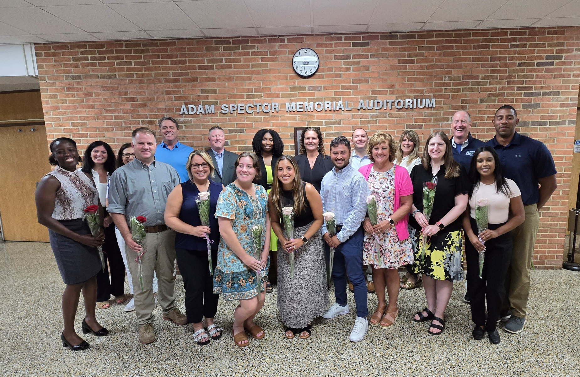 Huntington's newest tenured faculty members with district executives and Huntington School Board members