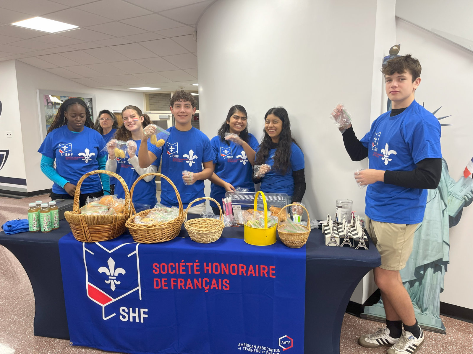 French Honor Society members manned a table in the high school's main lobby.