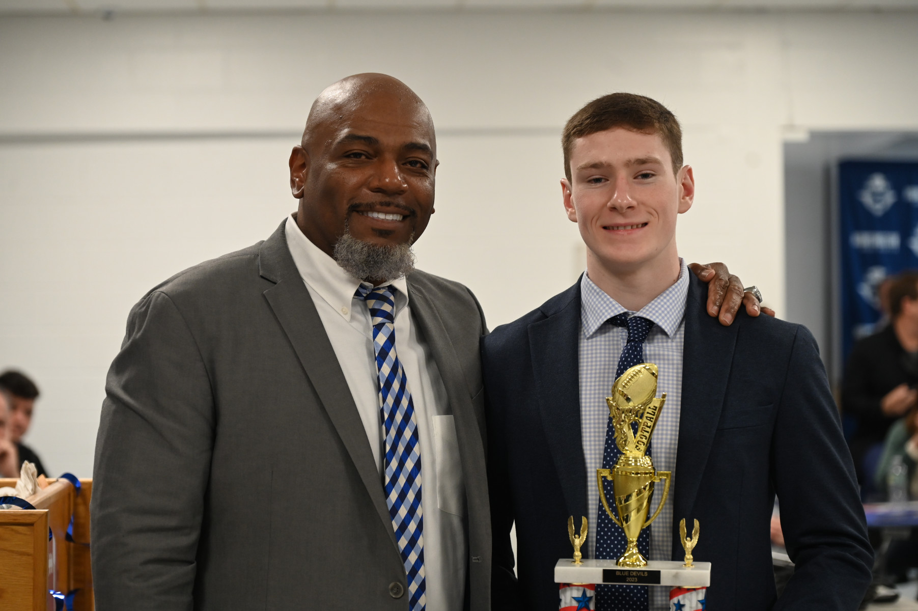  Head coach Ron Wilson with T. Christopher Pettit Scholar Athlete Award recipient Thomas Smith   