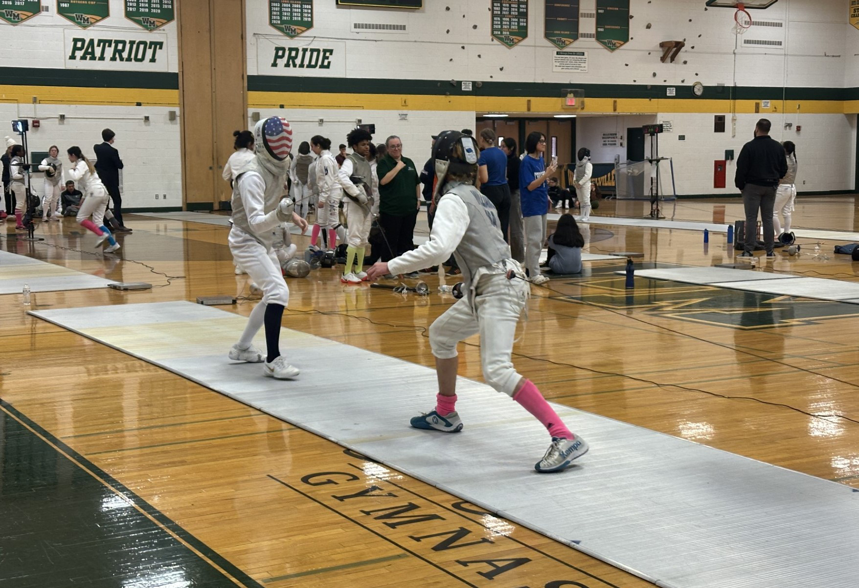  In the foil championship pool, Jake Amend (left) squared off against Chase Williams. Williams won the bout, 5-3.  
