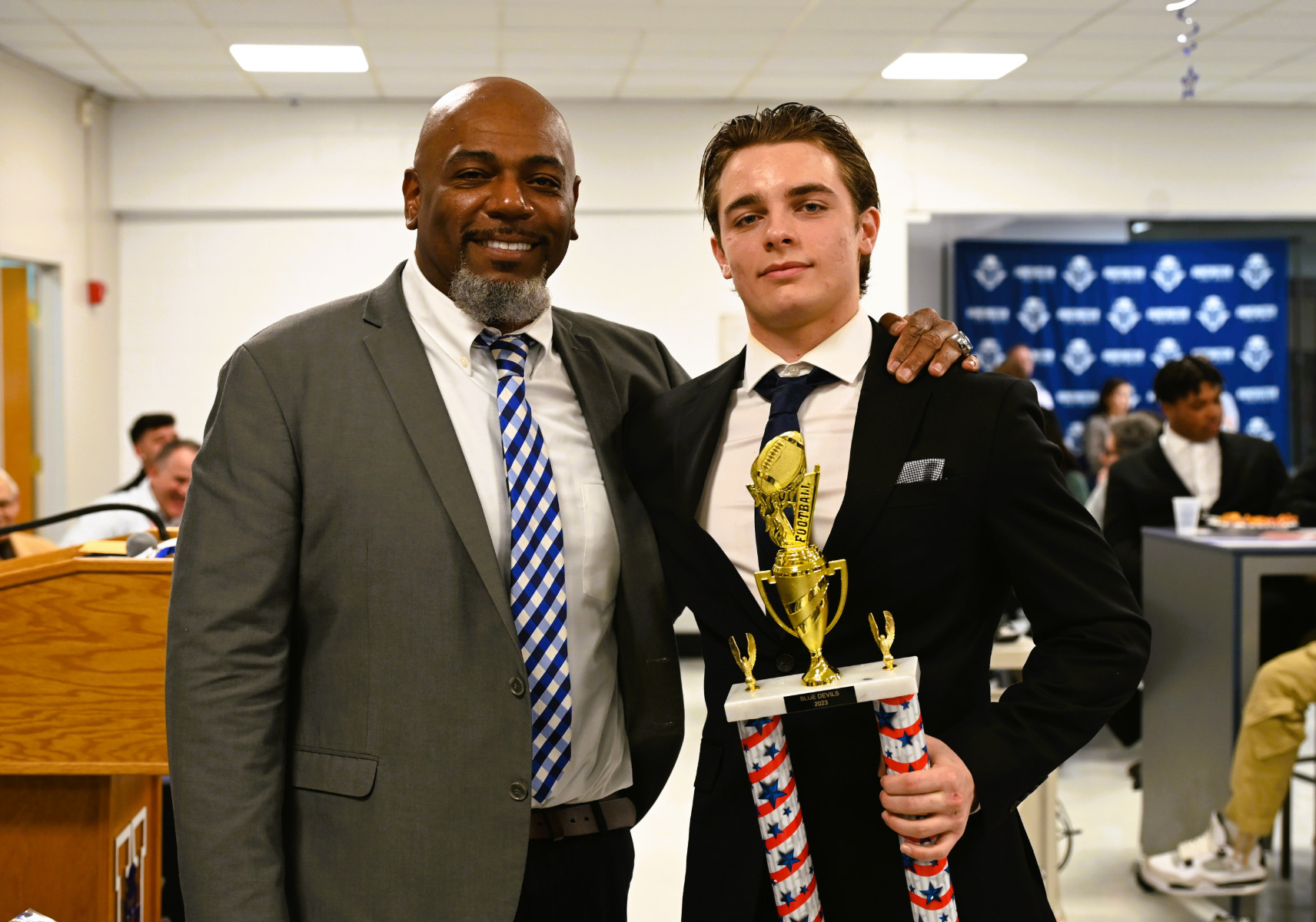  Joe Lucey Coaches Award recipient Joseph Zink with Huntington head coach Ronald Wilson   