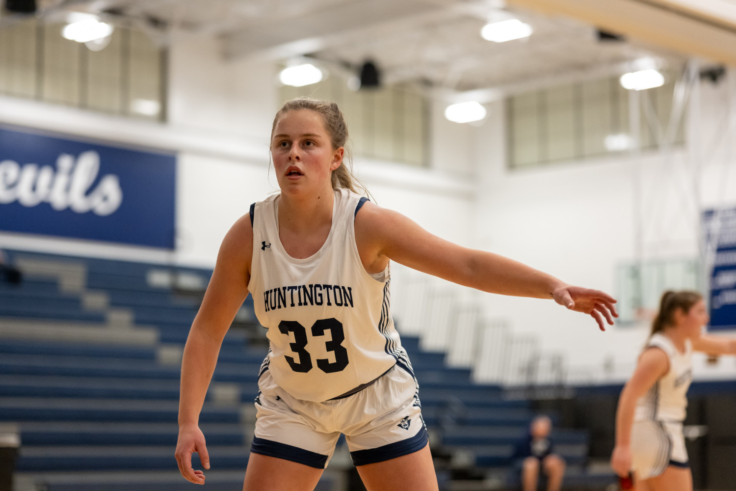 Huntington senior Kayleigh Bender gets set to play defense. (Darin Reed photo.)  