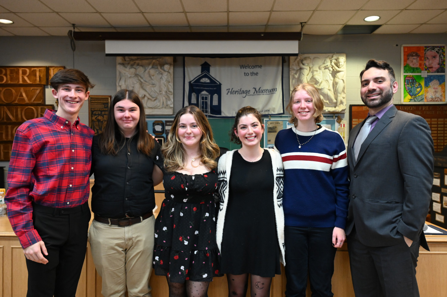  This year's Tri-M executive board with faculty advisor James DiMeglio   