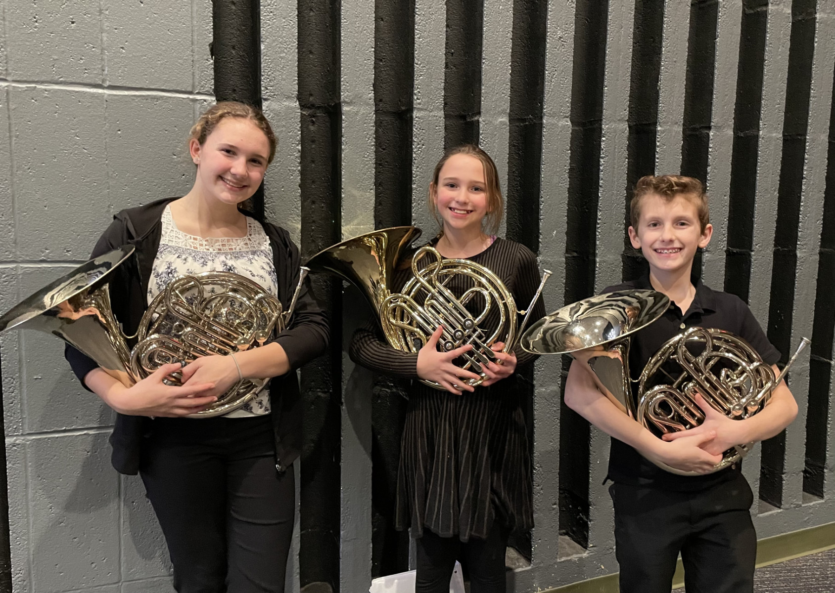  Huntington students Bella Duke, Emily Hiscox and Brady Duke at the Day of Horn.  