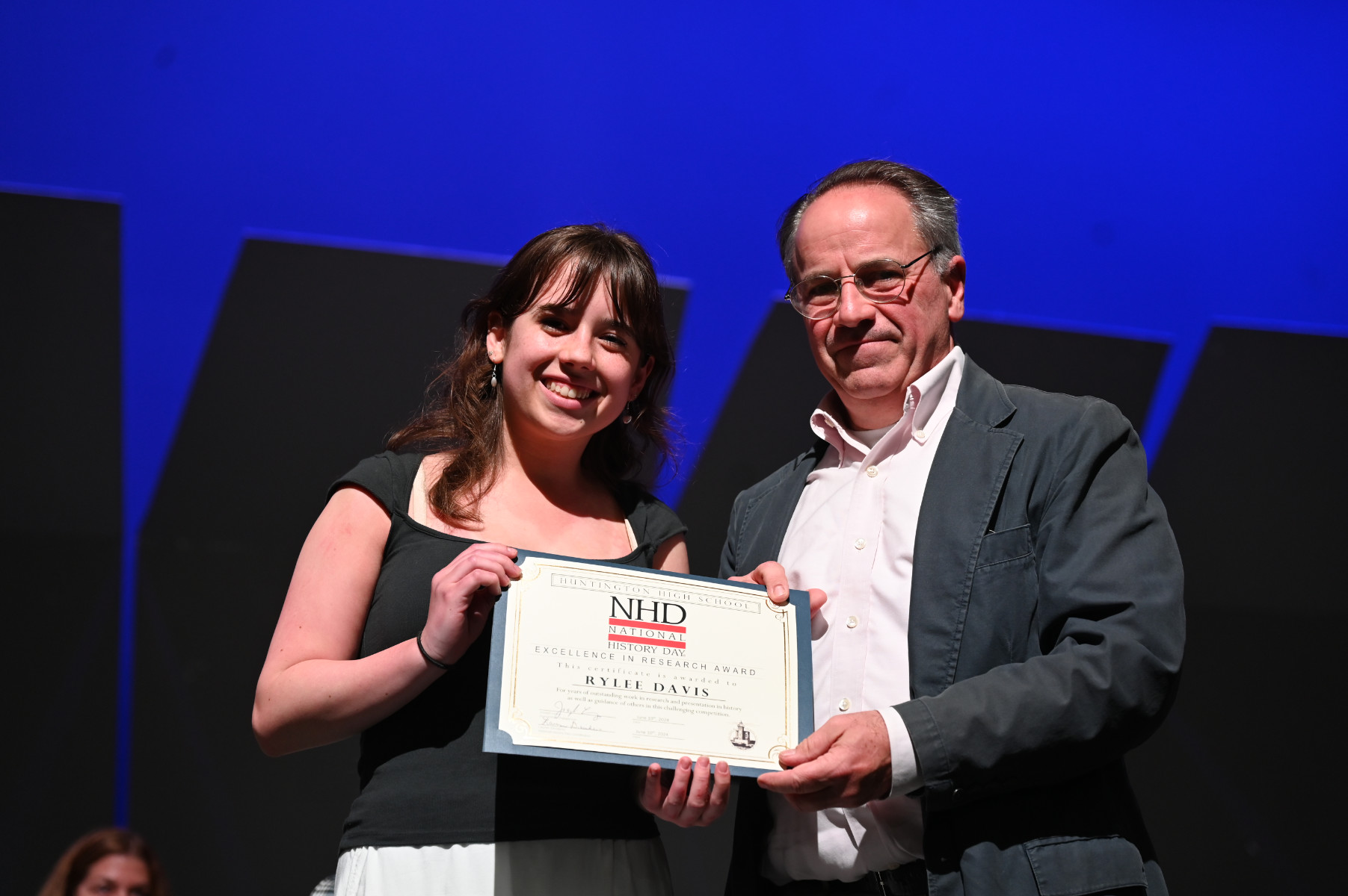  Excellent in Research Award recipient Rylee Davis with Chairman of Humanities Joseph Leavy   