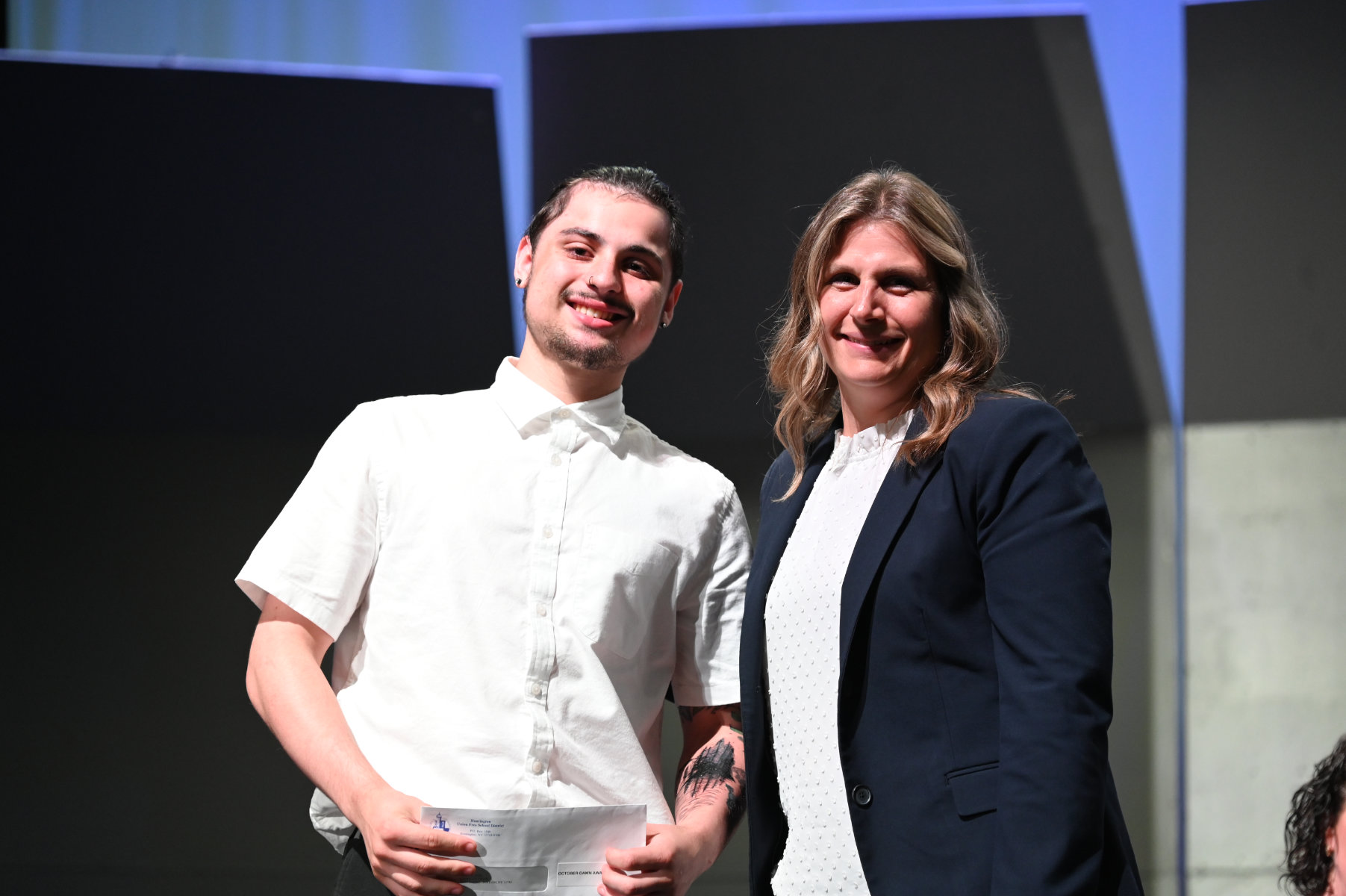  October Dawn Scholarship recipient Axel Parker with Assistant Principal Patricia Avelli  