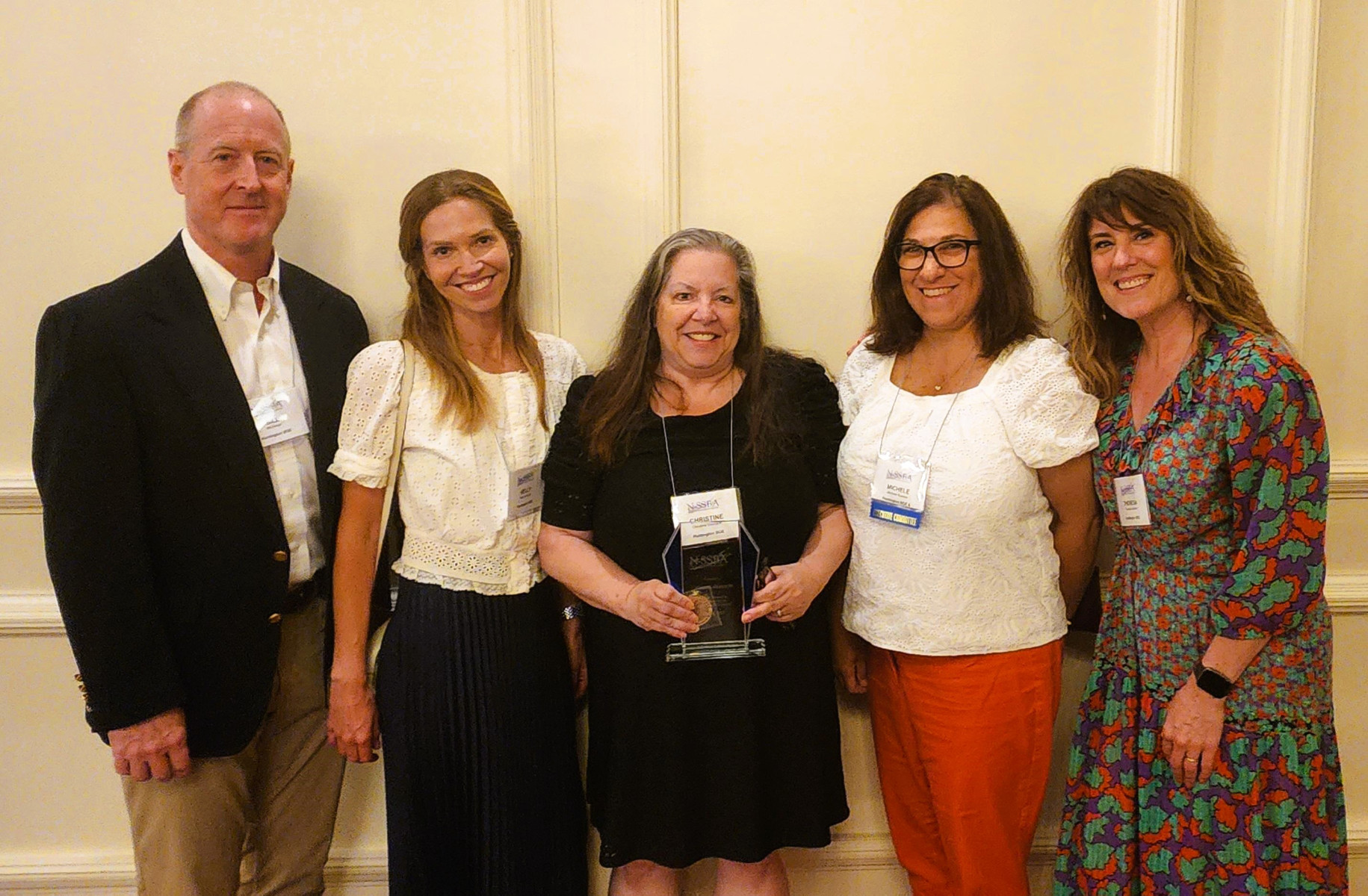  Veteran Huntington School Board member Christine Biernacki flanked by fellow trustees at last week's dinner   
