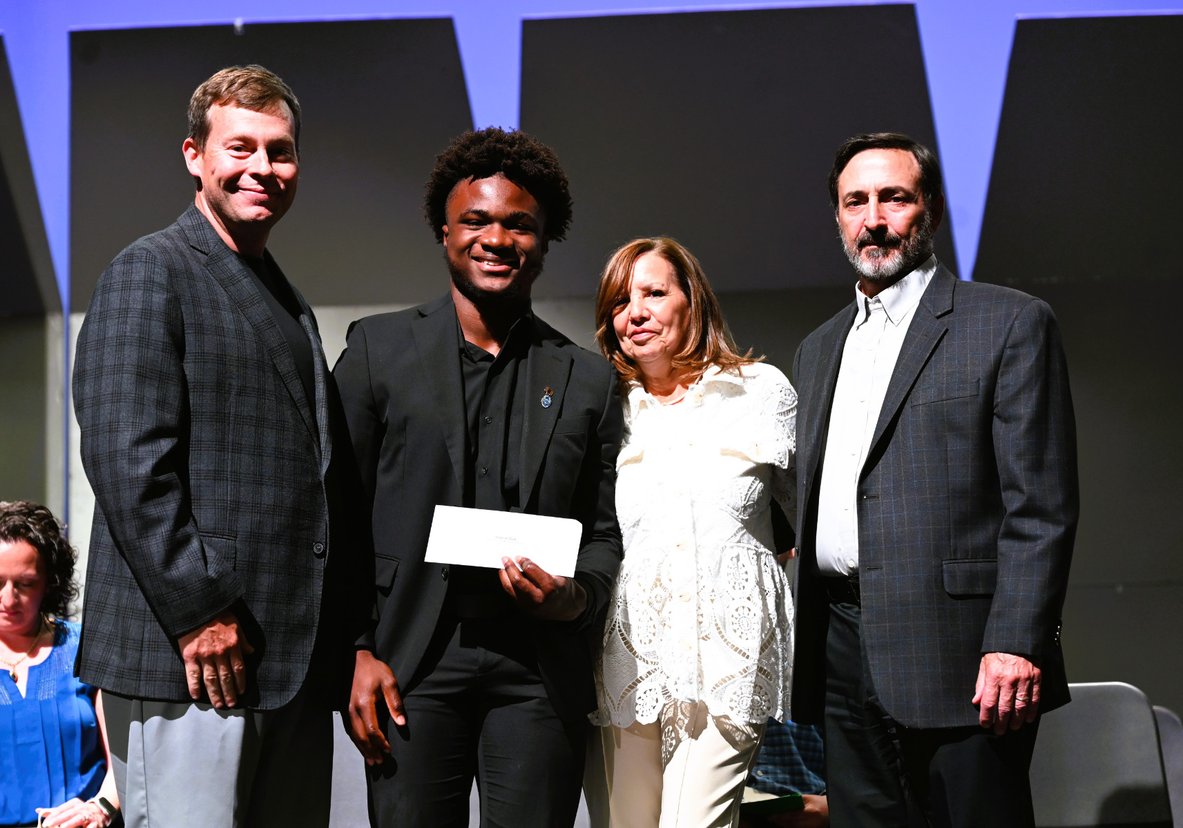  Justin Giani Award recipient David Dorilus Dax with James Graber, Linda and Joseph Giani   
