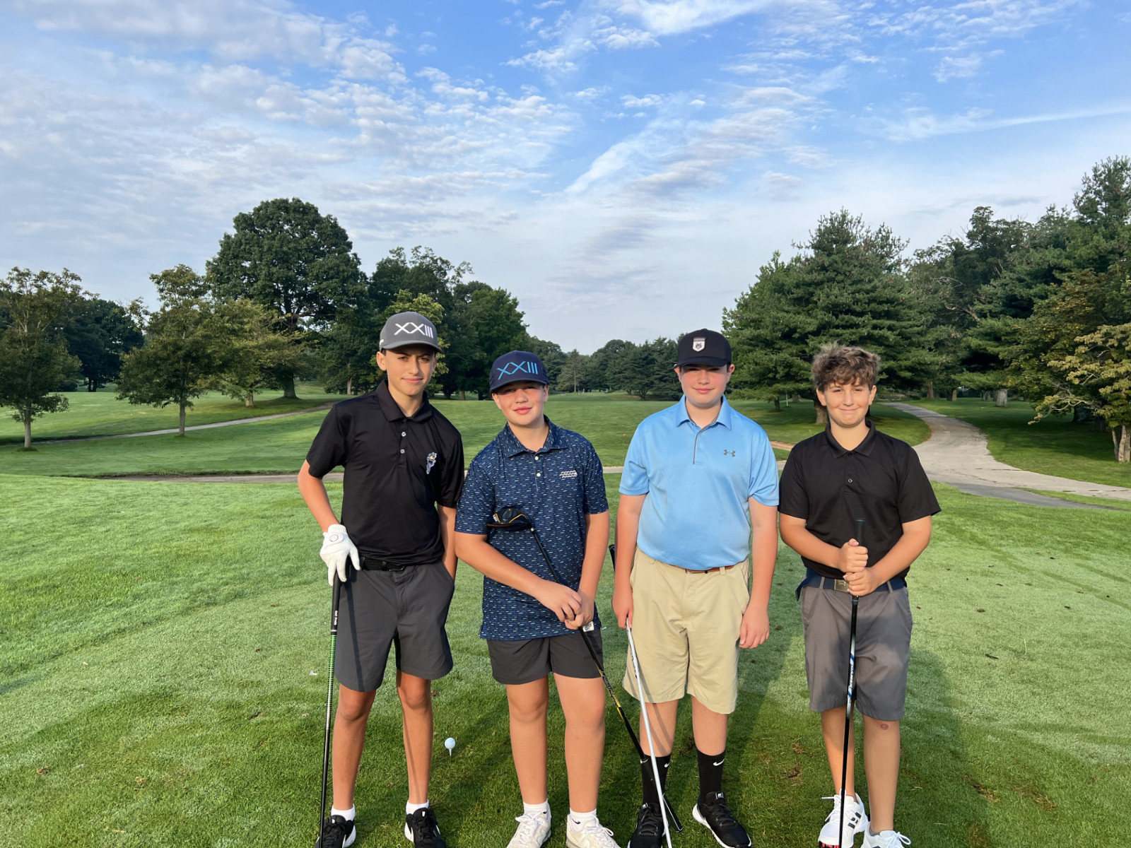  JV  boy golfers enjoy another successful round of play.  