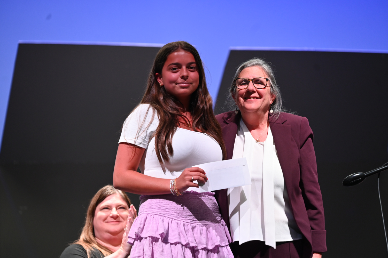 Lily Mitek with Tri CYA Director Debbie Rimler.    