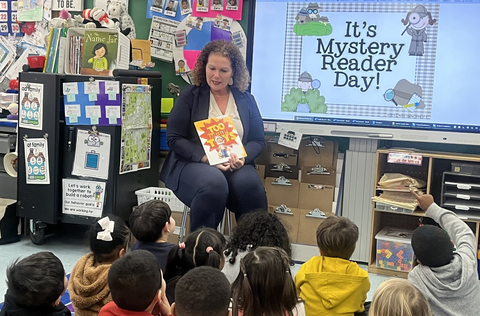  Assistant Superintendent Beth McCoy read to a class at Flower Hill.  
