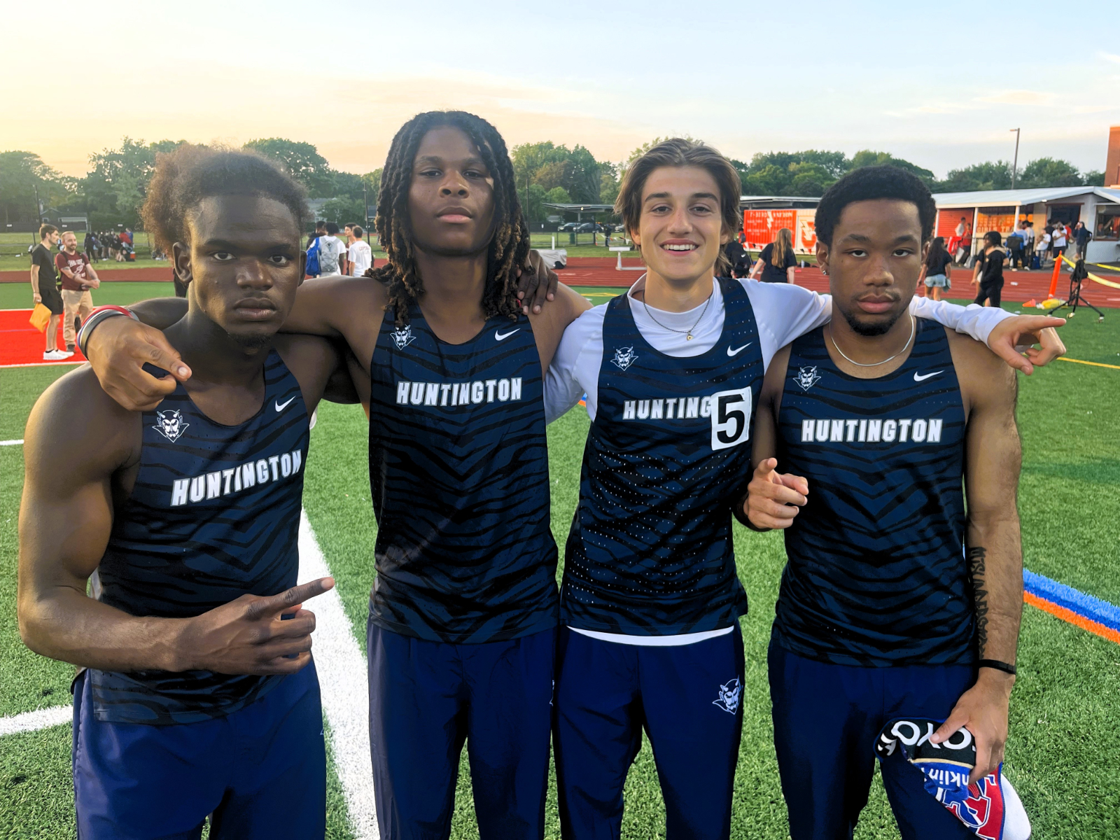  Titan Elysee, Nick Rosan, Nikolai Lulewich and Jahmar Francis won gold medals in the 4x400m relay.  
