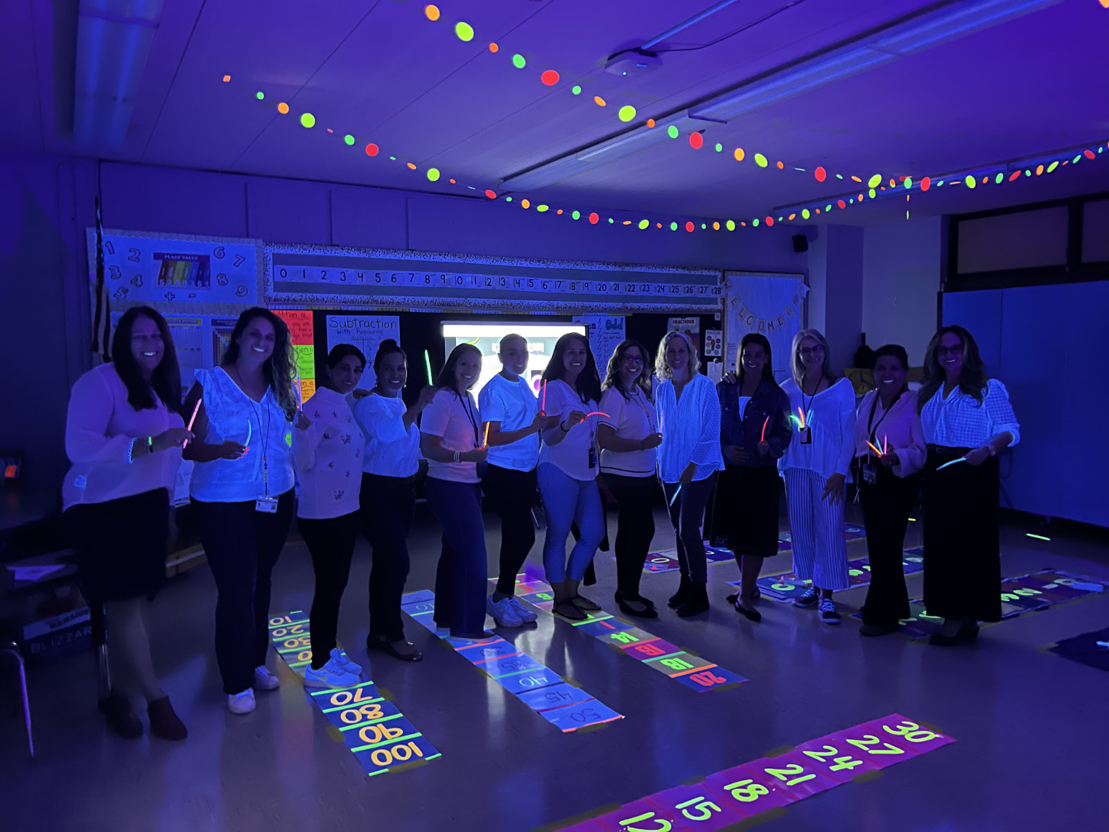 Jefferson faculty and staff at STEM Glow Night.