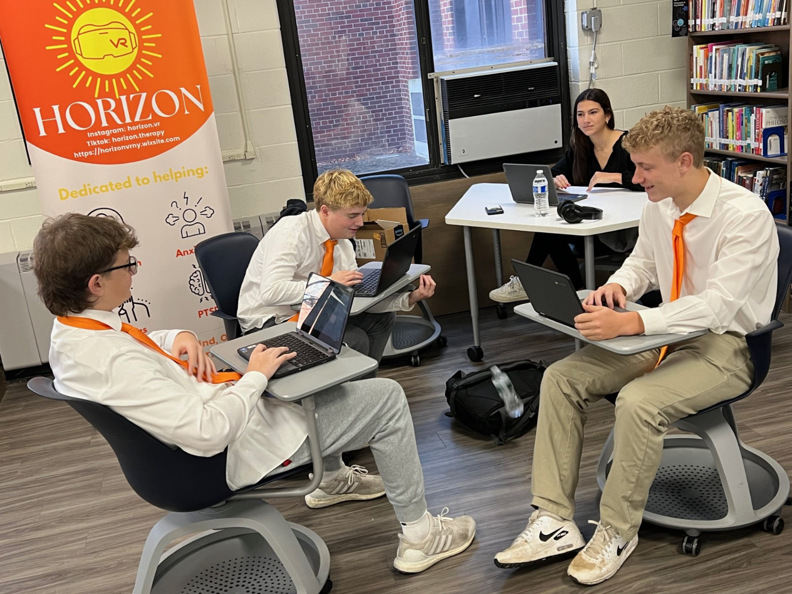 The Virtual Enterprise students worked out of a spacious room in the high school library