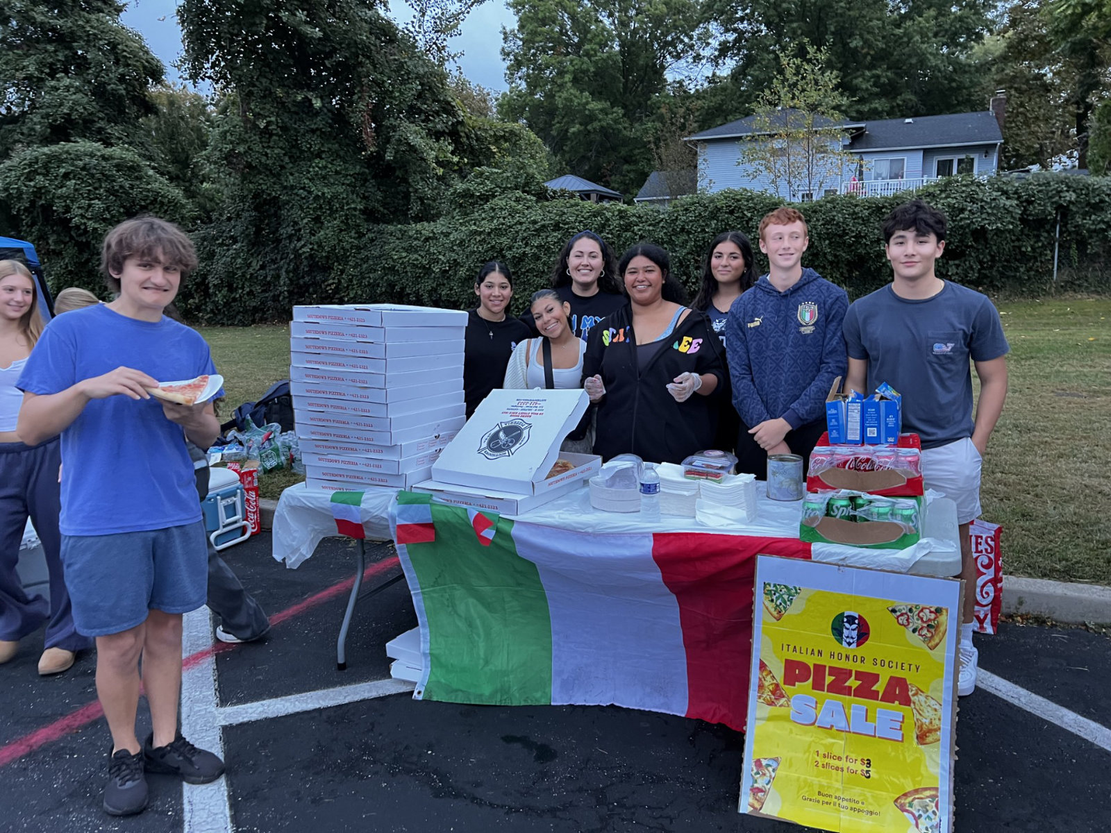 Italian Honor Society members manned a booth at the Homecoming Festival bonfire. (6)