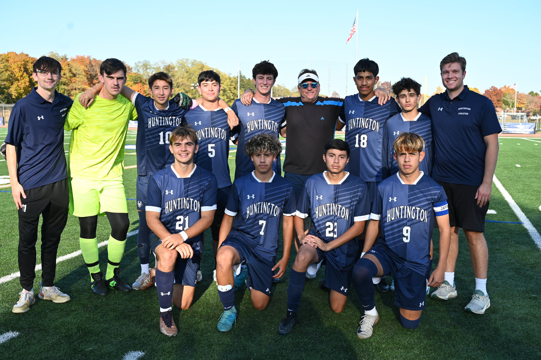 The Huntington boys' soccer seniors with their coaches on Senior Day at Blue Devil Stadium.