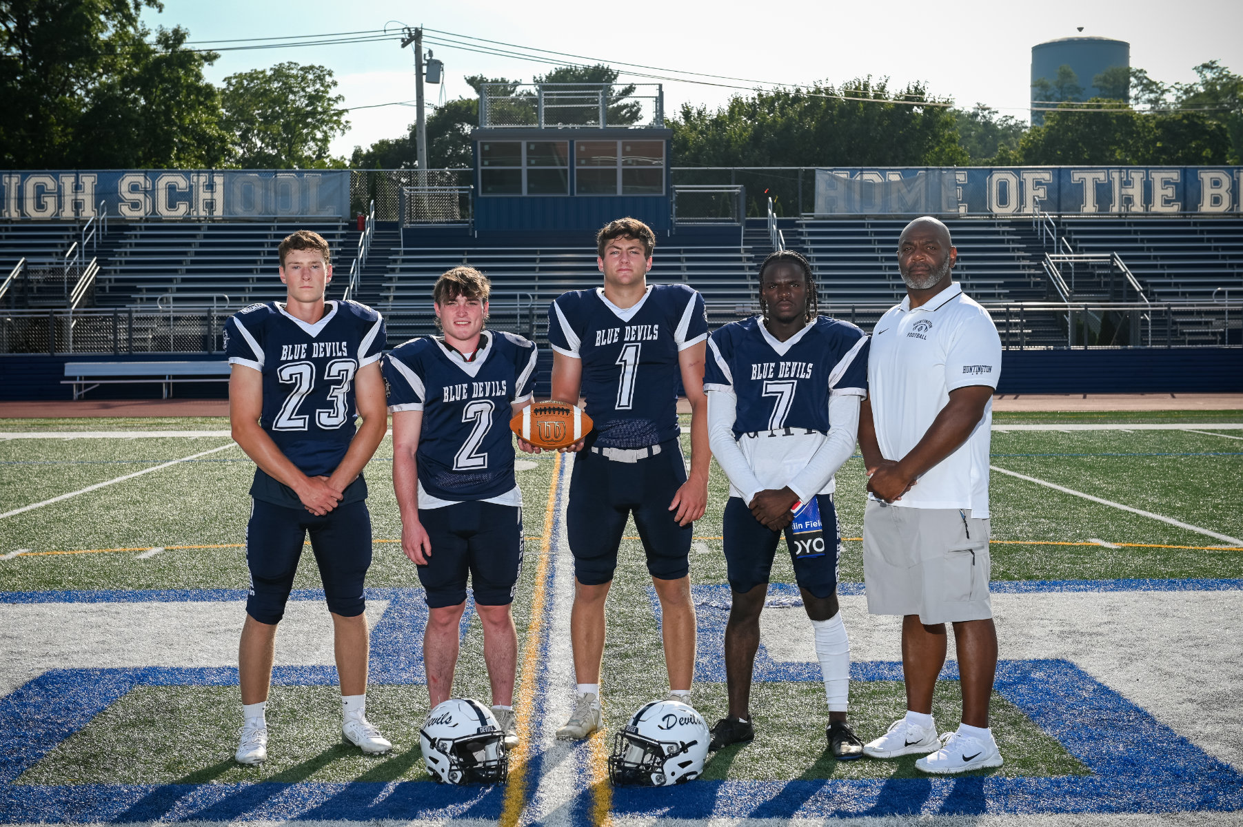 Coach Ron Wilson with captains Tom Smith, Tim McDonald, Keegan Malone and Titan Elysee.