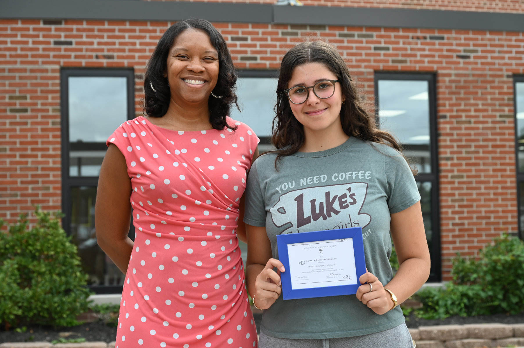 Huntington Principal Rochelle Brown and National Merit Commended senior Isabella Careccia-Johnson
